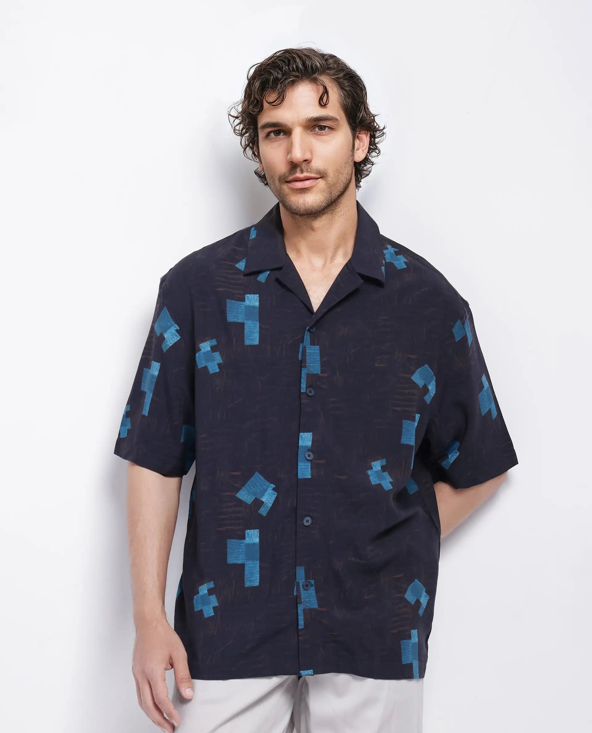 Rare Rabbit Men Riko Dark Brown Viscose Fabric Half Sleeve Cuban Collar Button Closure Oversized Fit Abstract Print Shirt