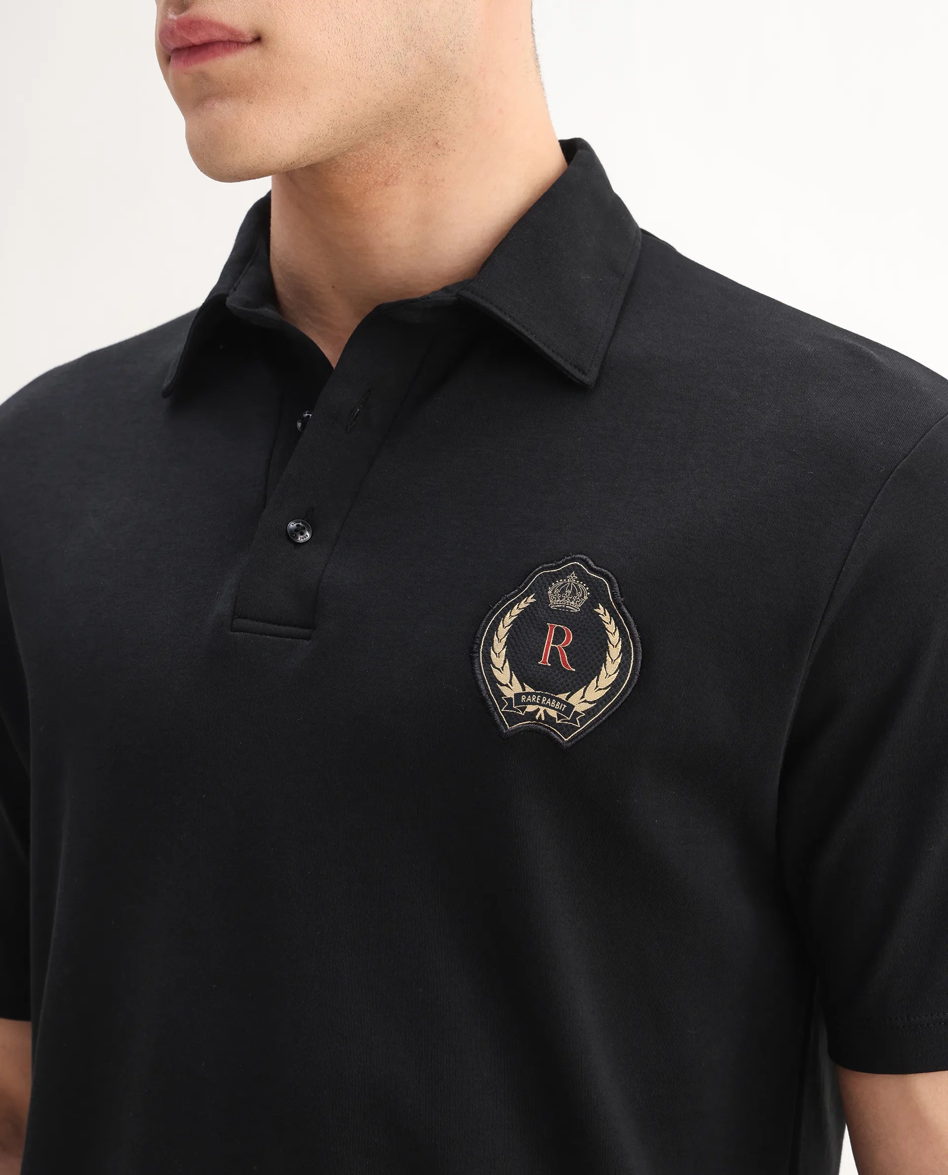 Rare Rabbit Men's Ritz Black` Cotton Plain Regular Fit Half Sleeve Polo