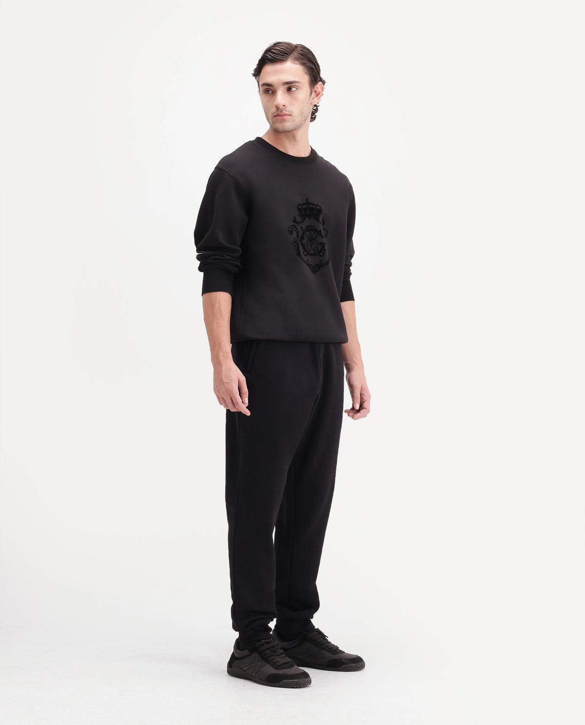 Rare Rabbit Men's Anderson-T-A26 Black Cotton Blend Regular Plain Track Pant