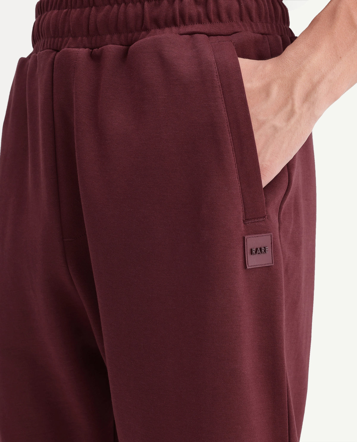 Rare Rabbit Men's Badro Dusky Red Cotton Blend Regular Plain Track Pant
