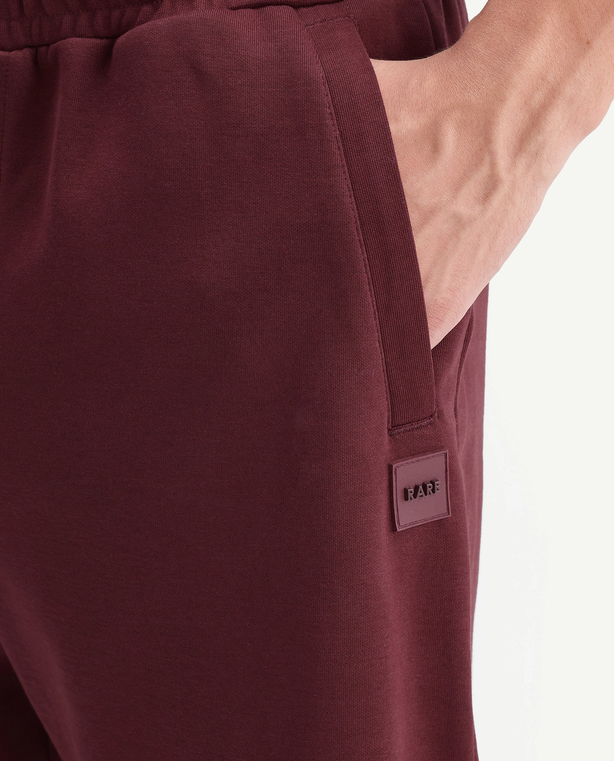 Rare Rabbit Men's Badro Dusky Red Cotton Blend Regular Plain Track Pant