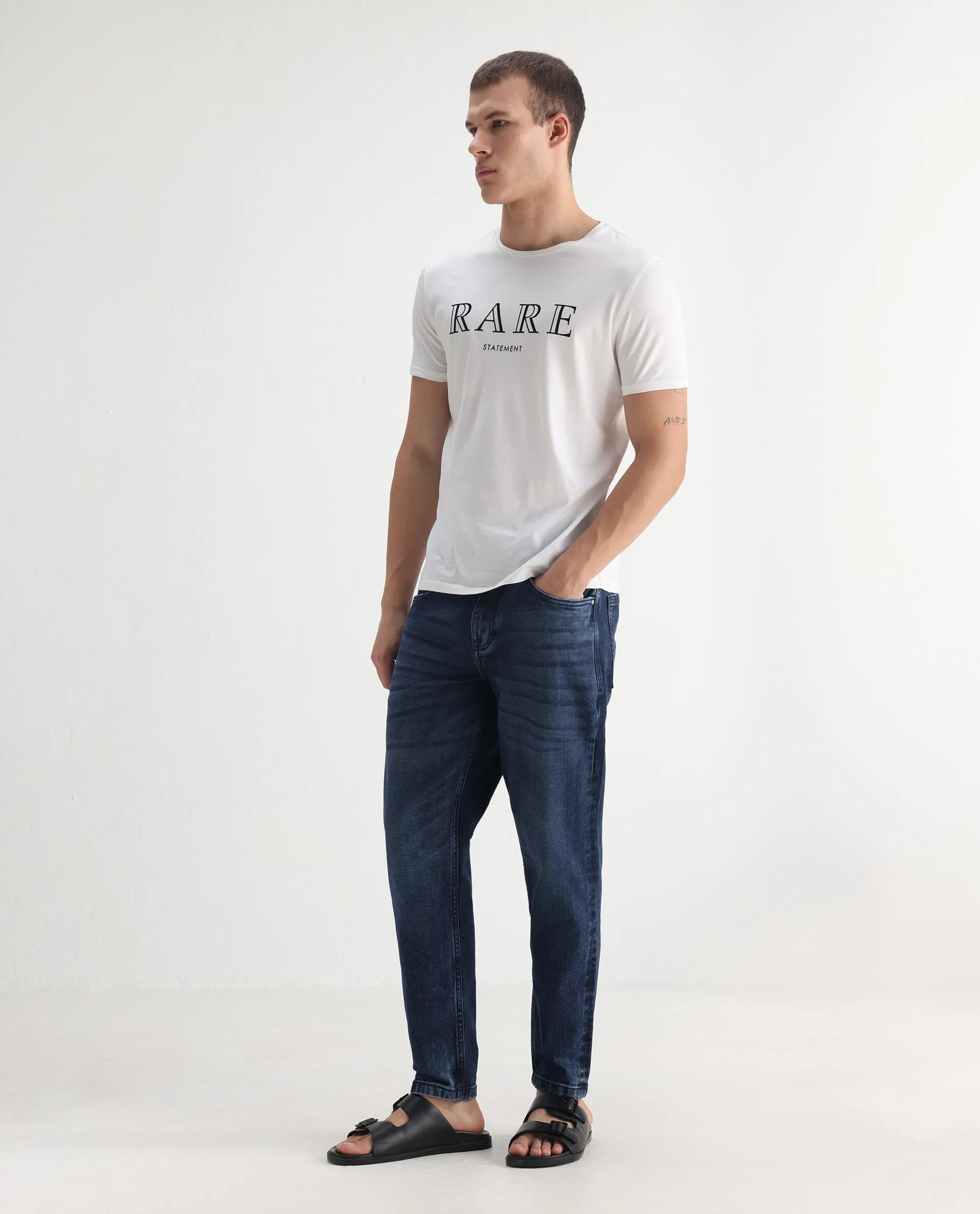 Rare Rabbit Men's Sam-2 Dusky Blue Cotton Plain Kurt Carrot Fit Jeans