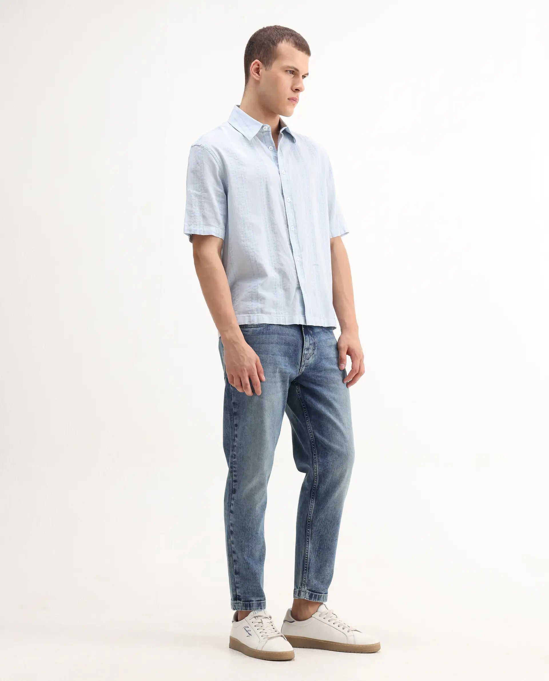 Rare Rabbit Men's Sam Blue Cotton Plain Kurt Carrot Fit Jeans