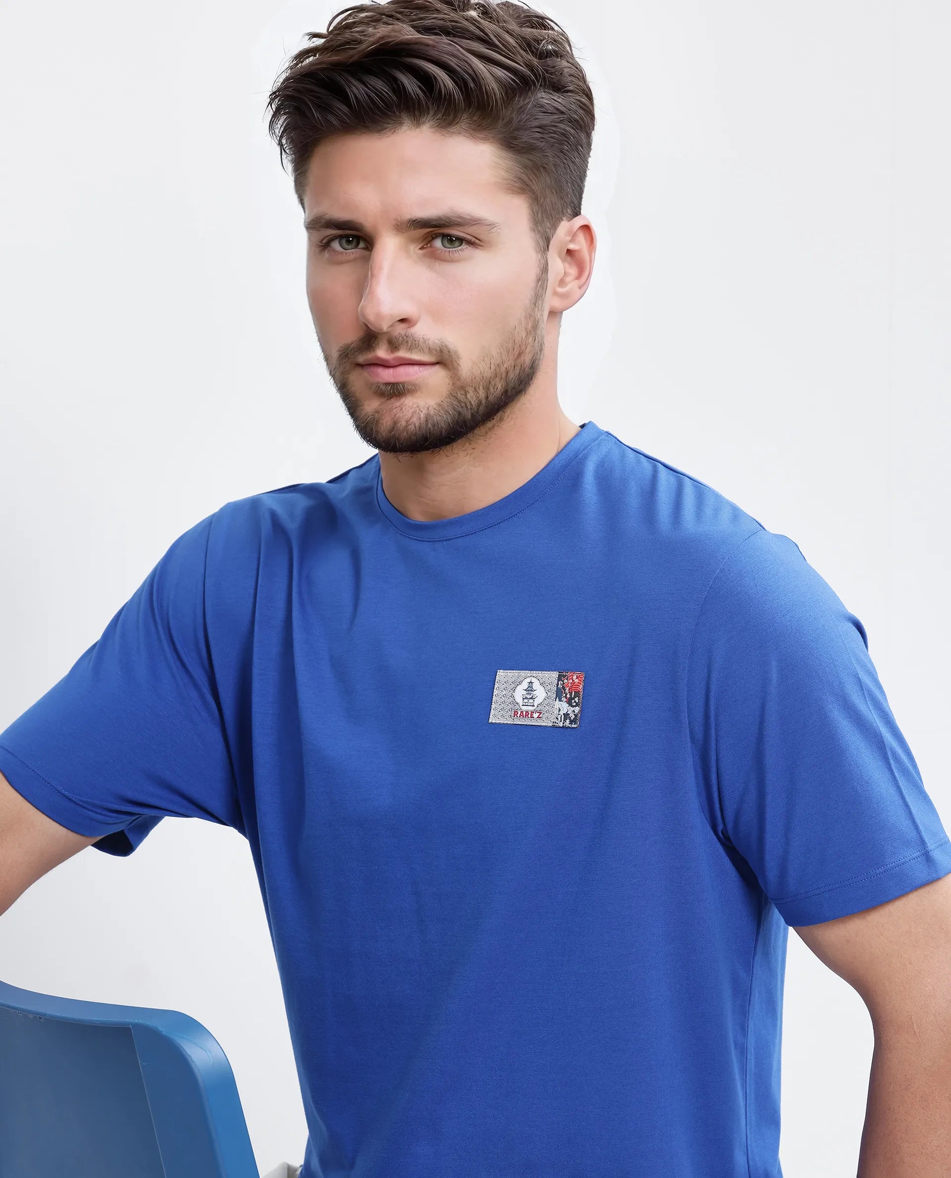 Rare Rabbit Men Saw Pastel Pastel Blue Cotton Lycra Fabric Short Sleeve Crew Neck Slip-On Plain T-Shirt