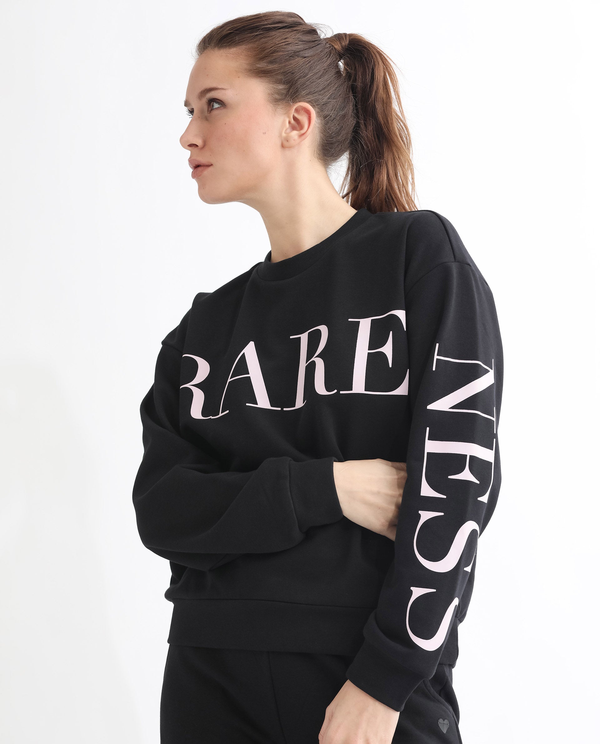 Rareism Women Shelly Black Poly Cotton Fabric Relaxed Fit Full Sleeves Solid Round Neck Sweatshirt