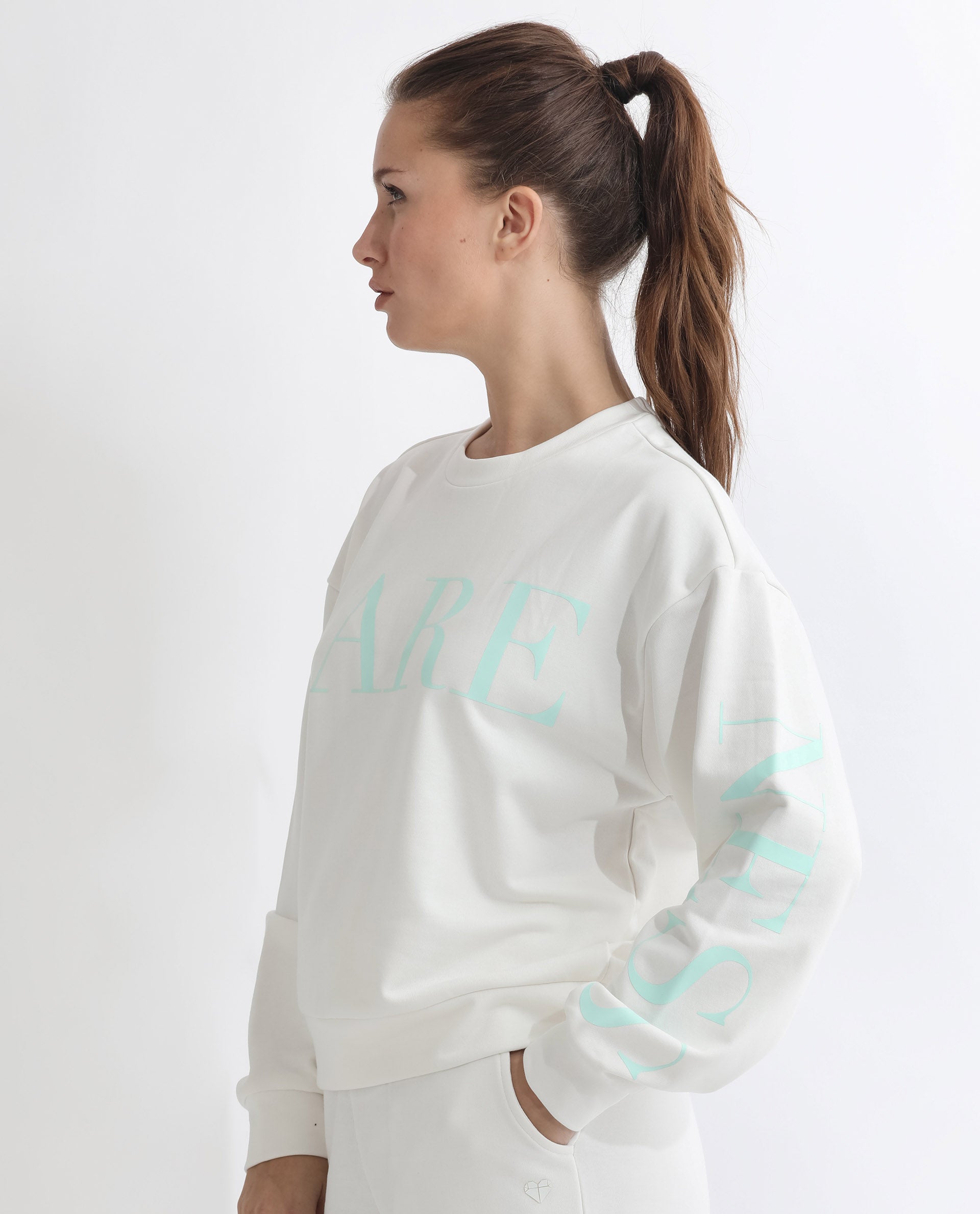 Rareism Articale Women Shelly Off White Poly Cotton Fabric Full Sleeves Cuffed Sleeve Round Neck Relaxed Fit Graphic Print Sweatshirt