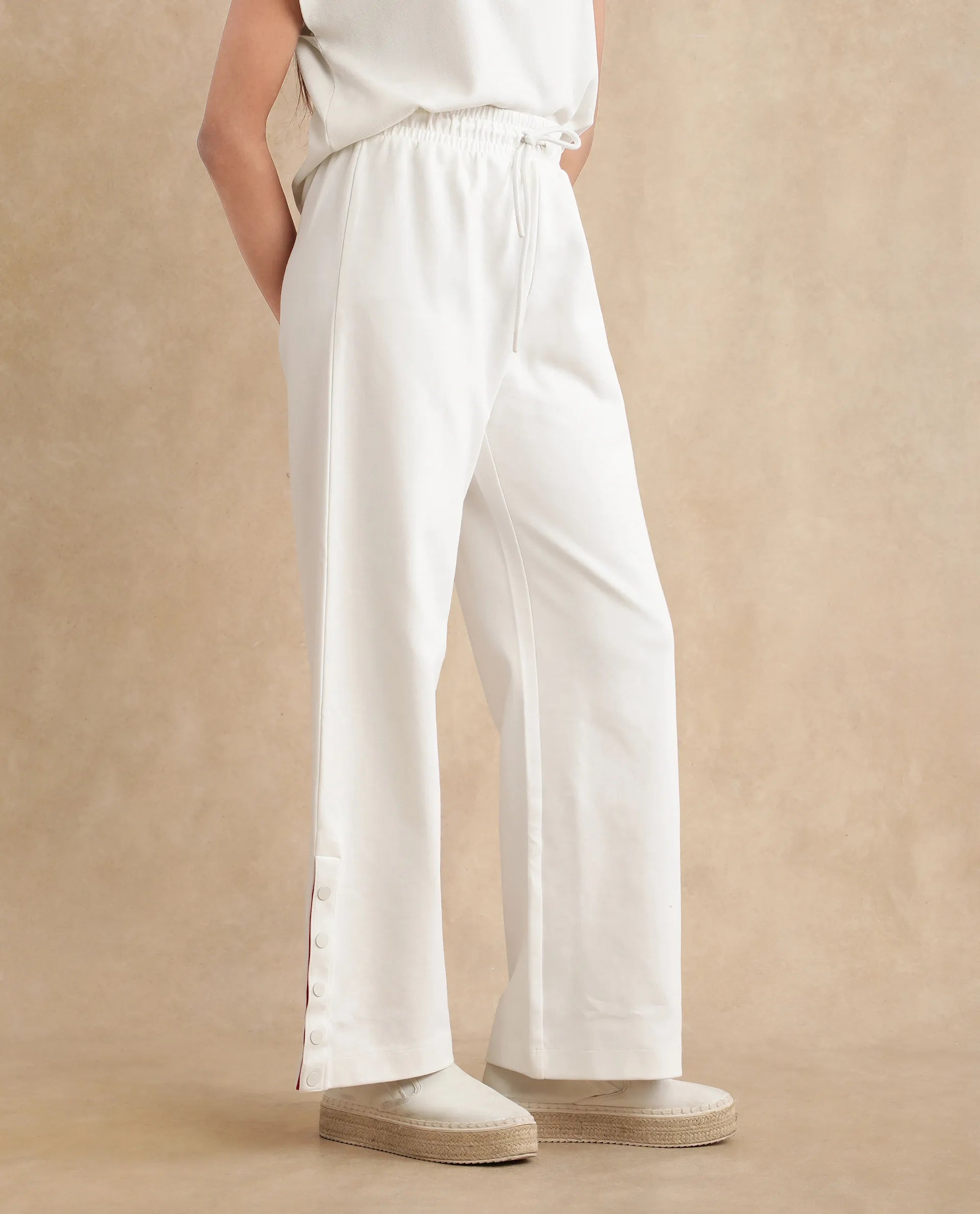 Rareism Women Slite White Cotton Fabric Relaxed Fit Plain Trouser