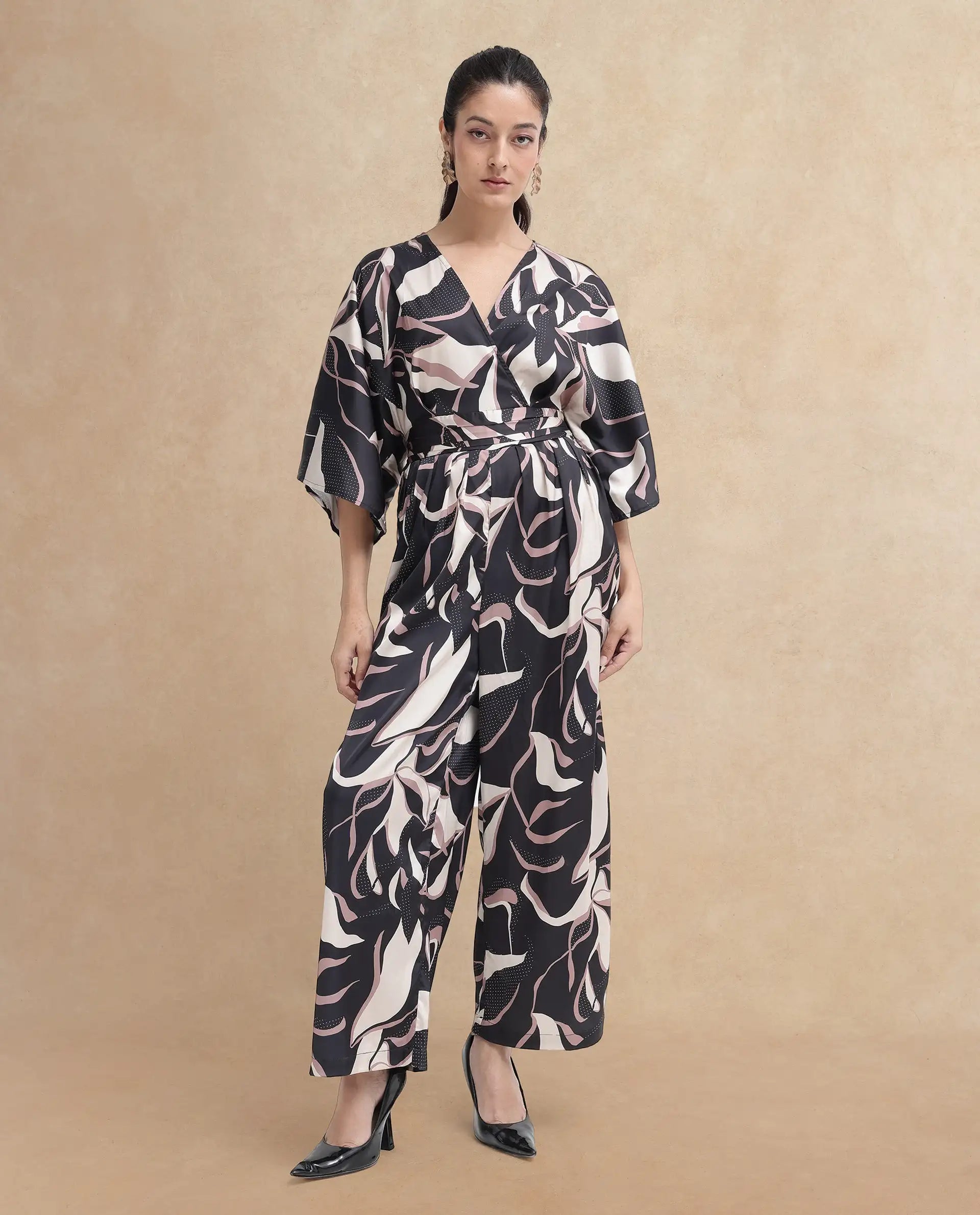 Rareism Women Sonrka Multi Zipper Closure Extended Sleeves Over Lap Neck Relaxed Fit Abstract Print Maxi Jump Suit