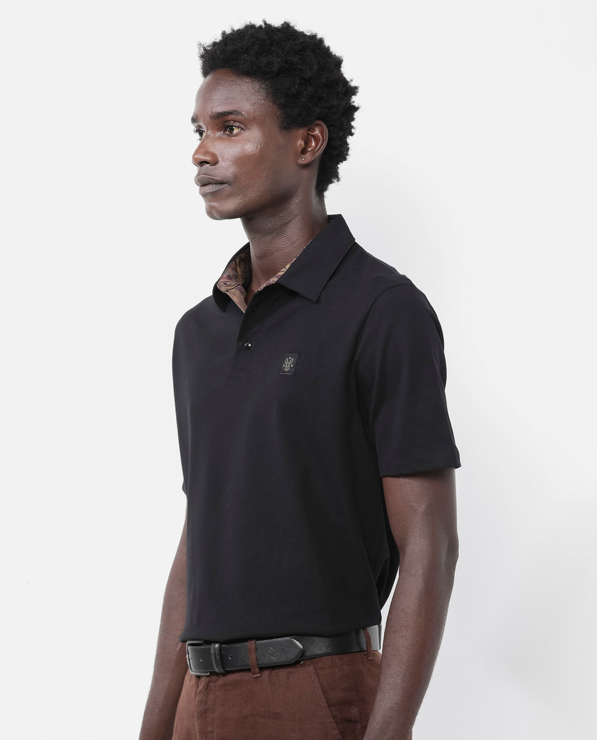 Rare Rabbit Men's Spencer Black Short Sleeve Button Closure Regular Fit Solid Polo T-Shirt