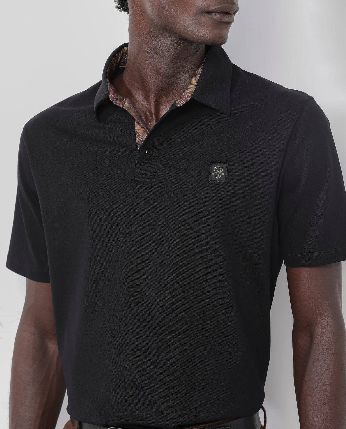 Rare Rabbit Men's Spencer Black Short Sleeve Button Closure Regular Fit Solid Polo T-Shirt