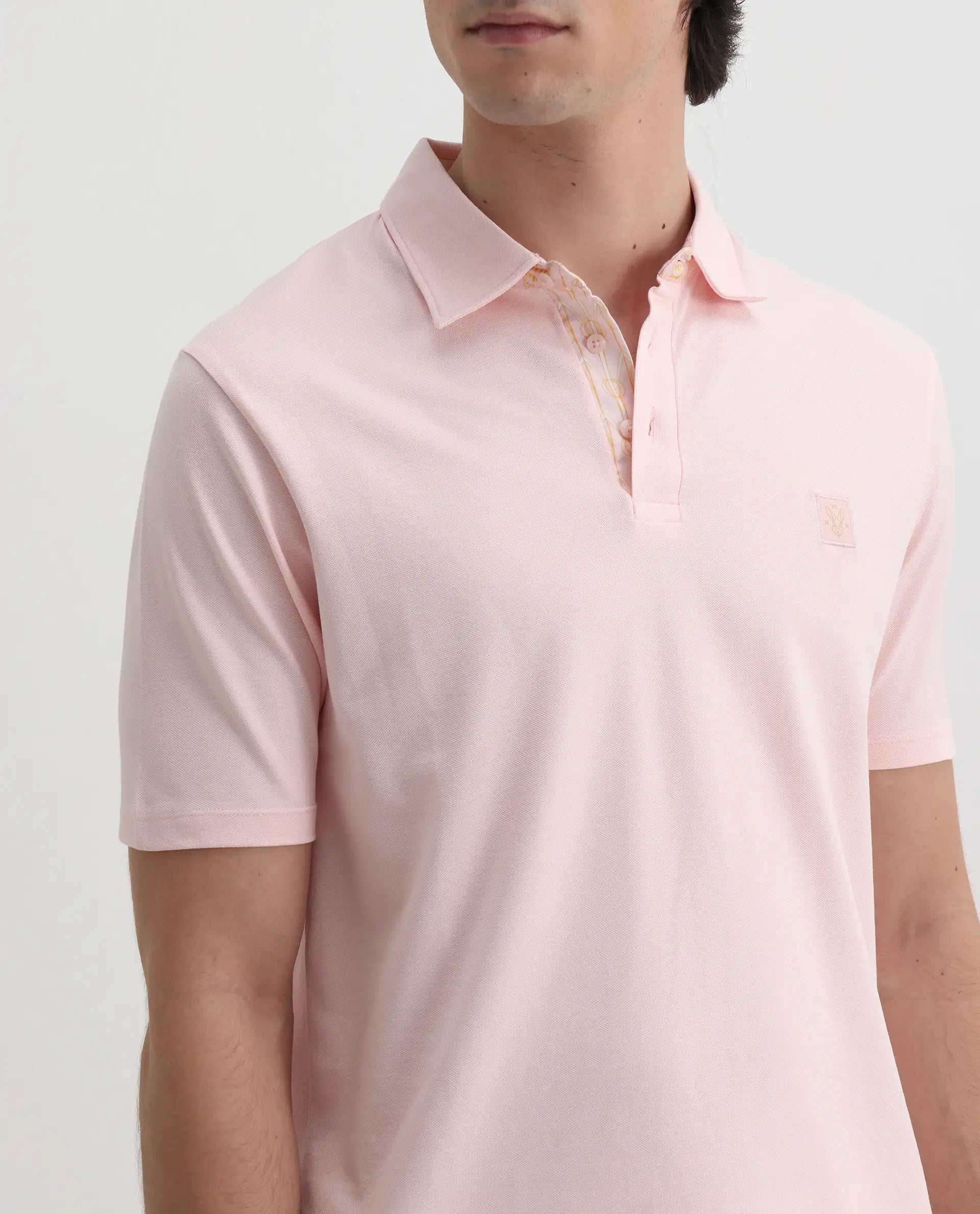 Rare Rabbit Men's Spencer Light Pink Cotton Plain Regular Fit Half Sleeve Polo
