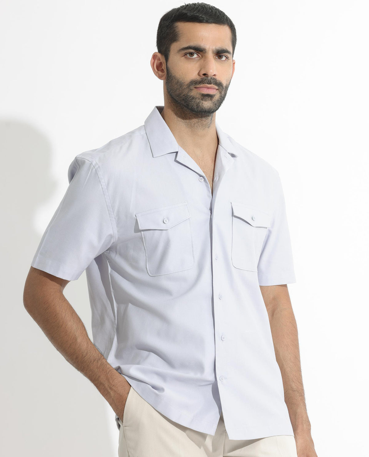 Rare Rabbit Men's Salford Pastel Blue Cuban Collar Half Sleeves Two Flap Pocket Solid Shirt