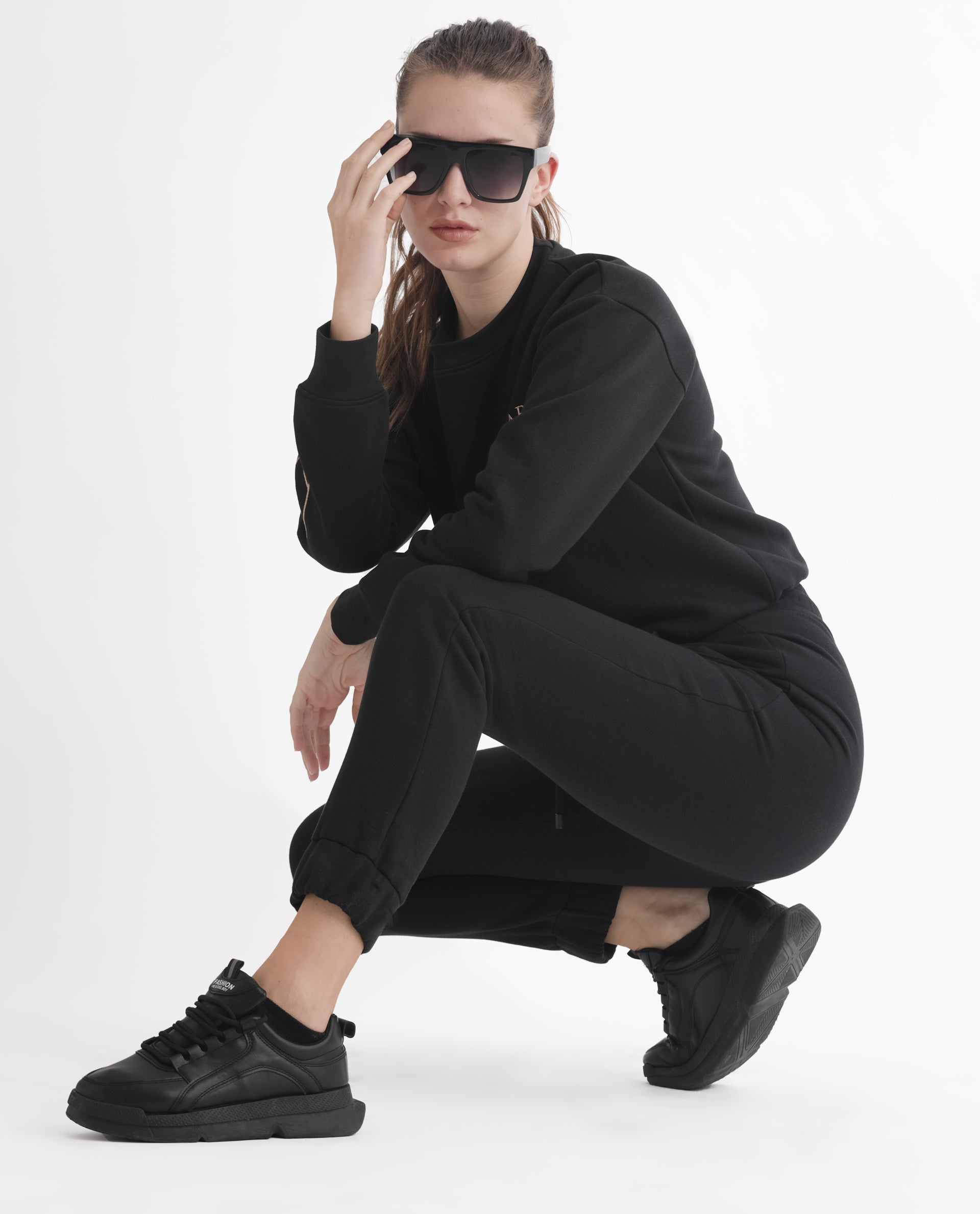 Rareism Women Terac F Black Poly Cotton Fabric Regular Fit Solid Mid Rise Ankle Length Track Pant