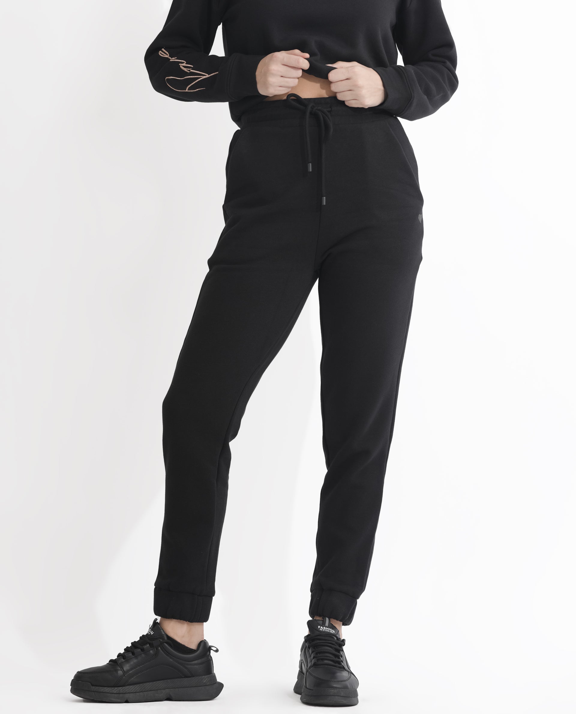 Rareism Women Terac F Black Poly Cotton Fabric Regular Fit Solid Mid Rise Ankle Length Track Pant