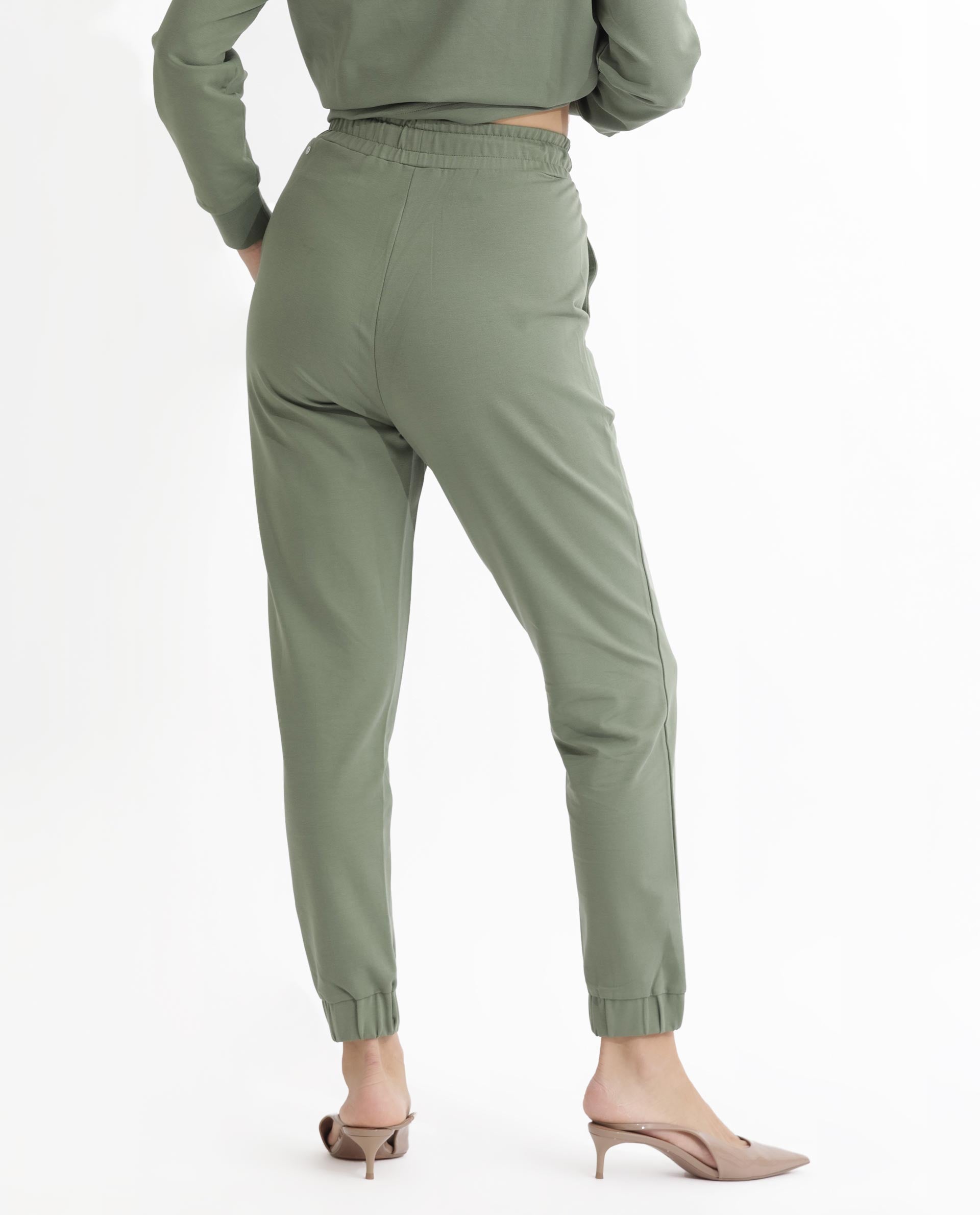 Rareism Women Terac Dusky Green Cotton Lycra Fabric Regular Fit Solid Mid Rise Ankle Length Track Pant