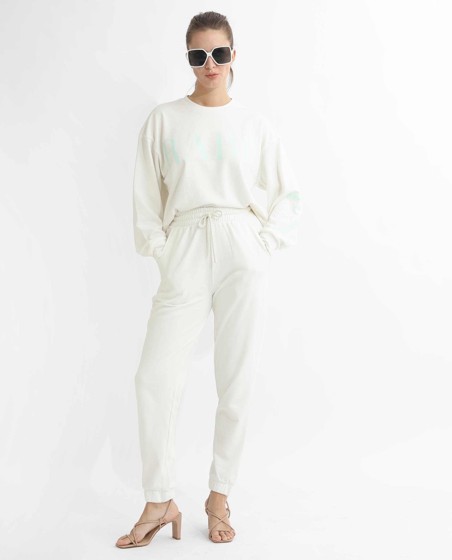 Rareism Articale Women Terac T Off White Poly Cotton Fabric Drawstring Closure Regular Fit Plain Ankle Length Track Pant