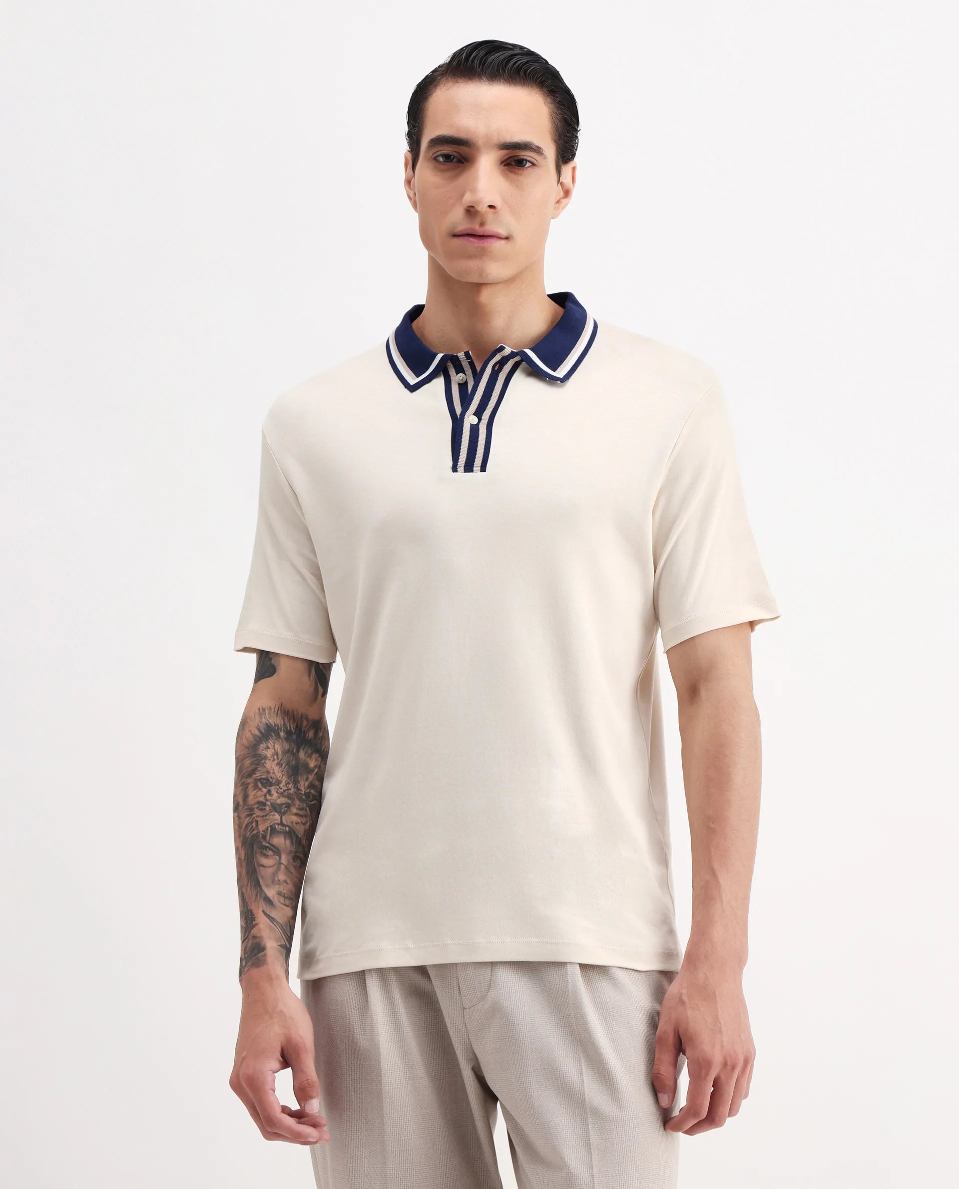 Rare Rabbit Men's Territ Pastel Yellow Cotton Plain Regular Fit Half Sleeve Polo