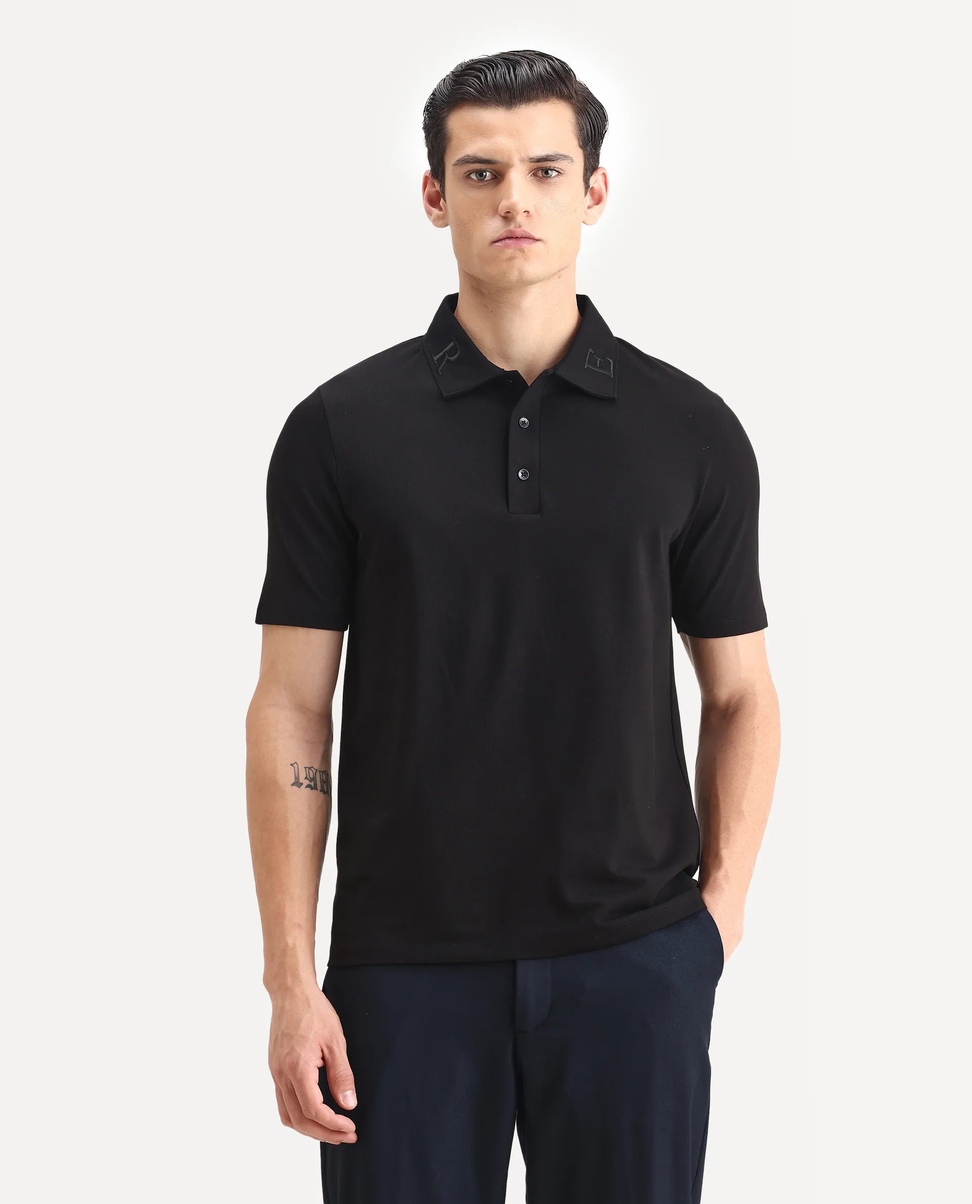 Rare Rabbit Men's Theron Black Cotton Blend Plain Regular Fit Half Sleeve Polo