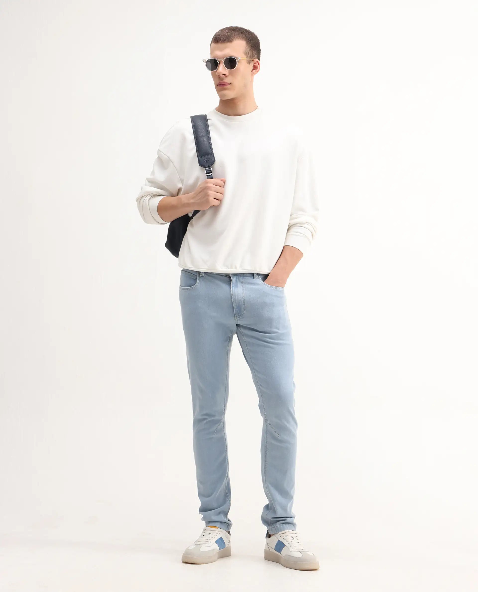 Rare Rabbit Men's Toke Light Blue Cotton Plain Hawk Slim Fit Jeans