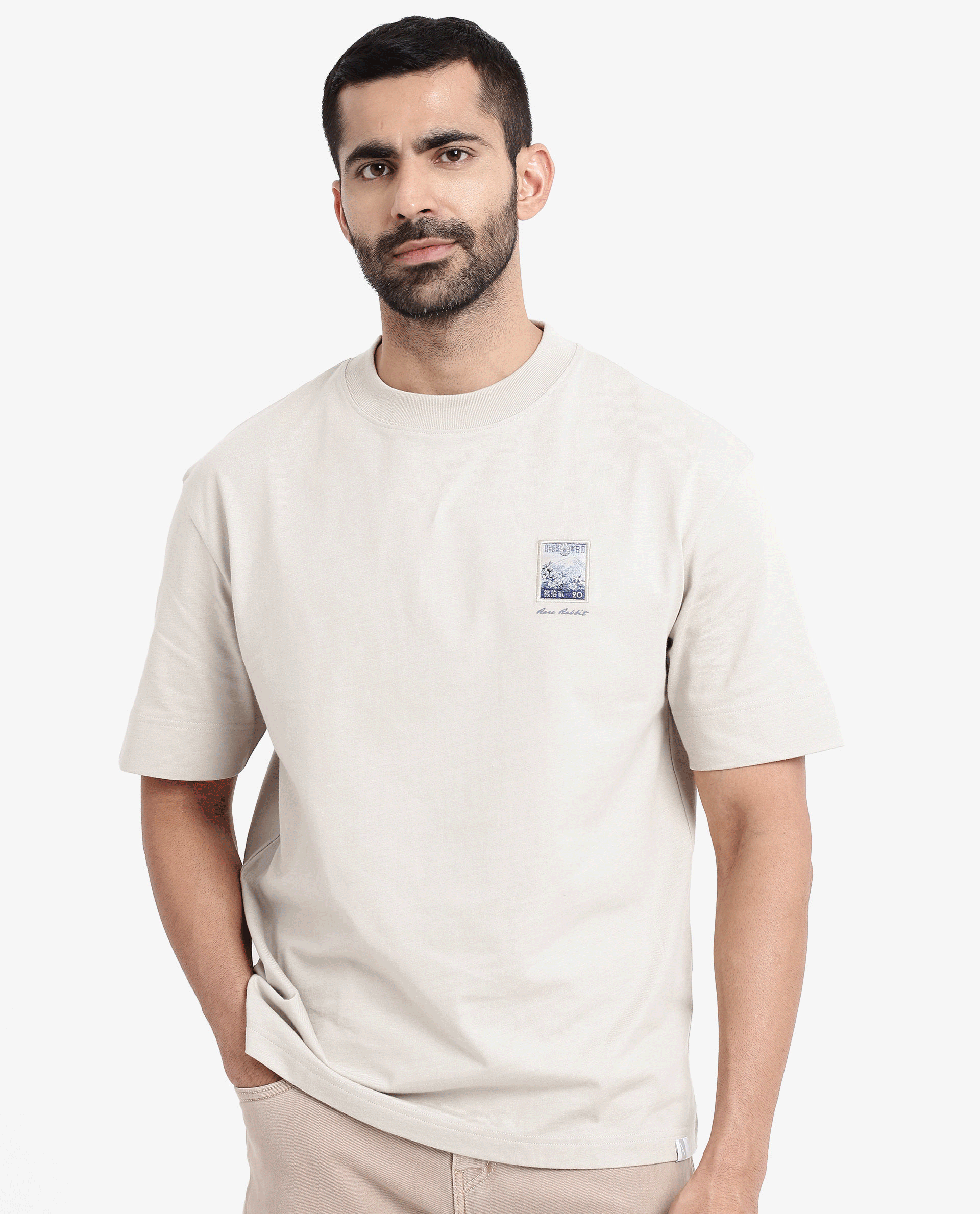 Rare Rabbit Men Trams Beige Cotton Fabric Short Sleeve Crew Neck Oversized Fit Graphic Print T-Shirt