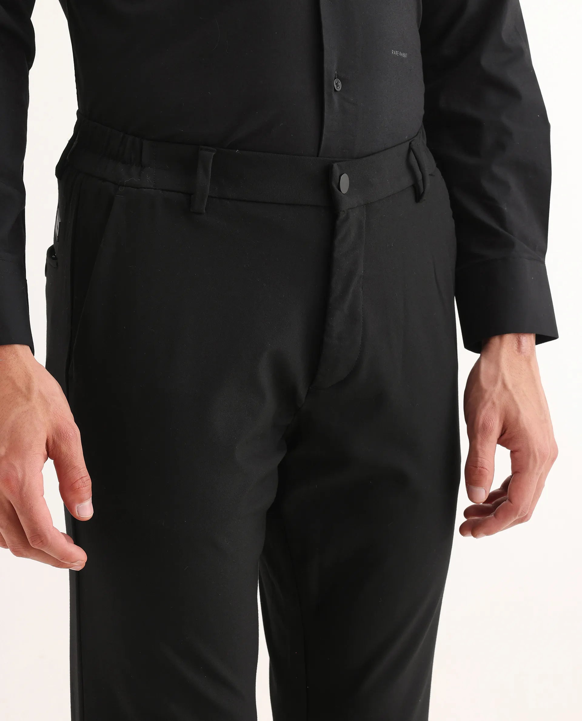 Rare Rabbit Men's Travel-11 Black Polyester Blend Plain Regular Fit Trouser