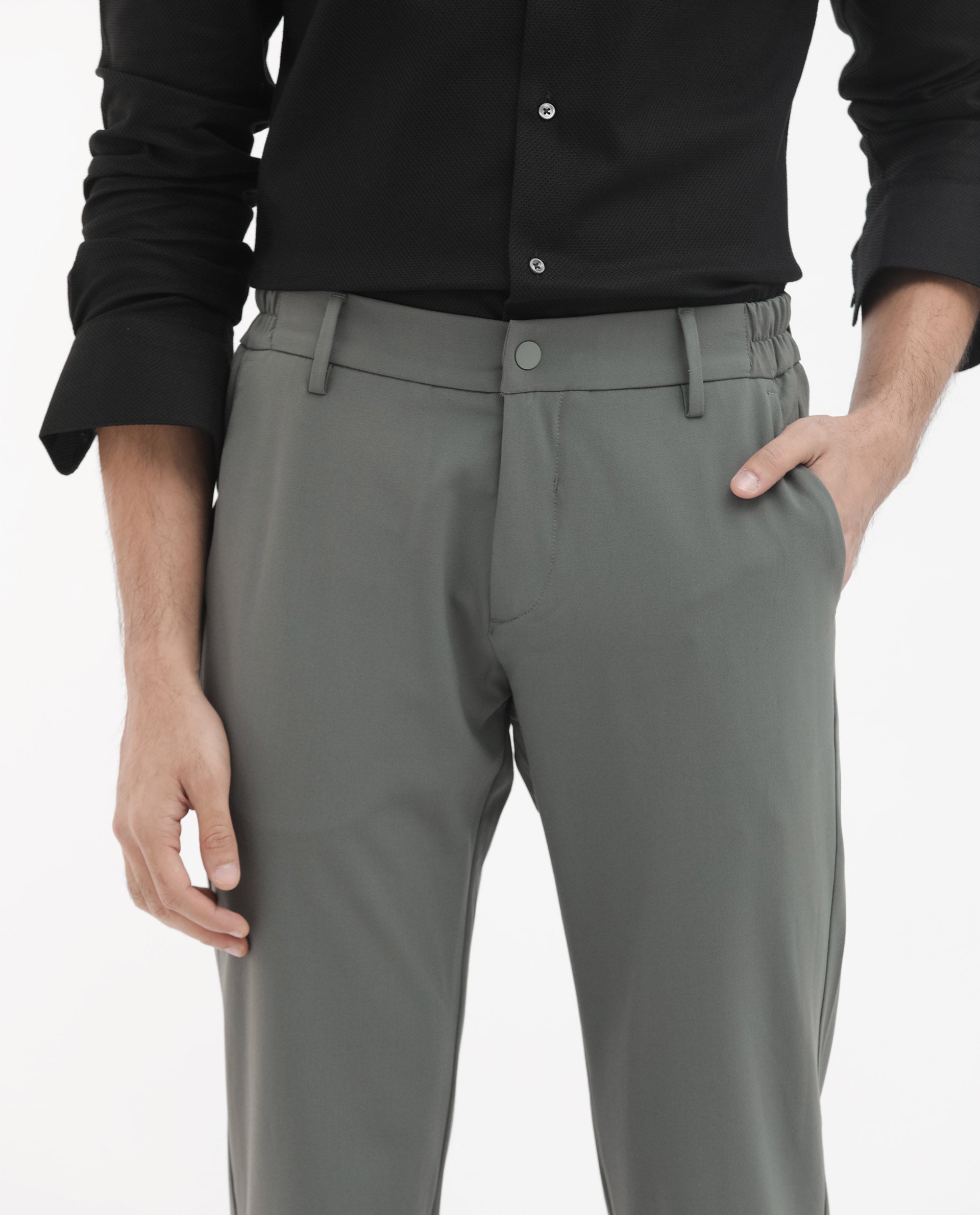 Rare Rabbit Men's Travel-24 Green Poly Viscose Lycra Fabric Blend Solid Trousers