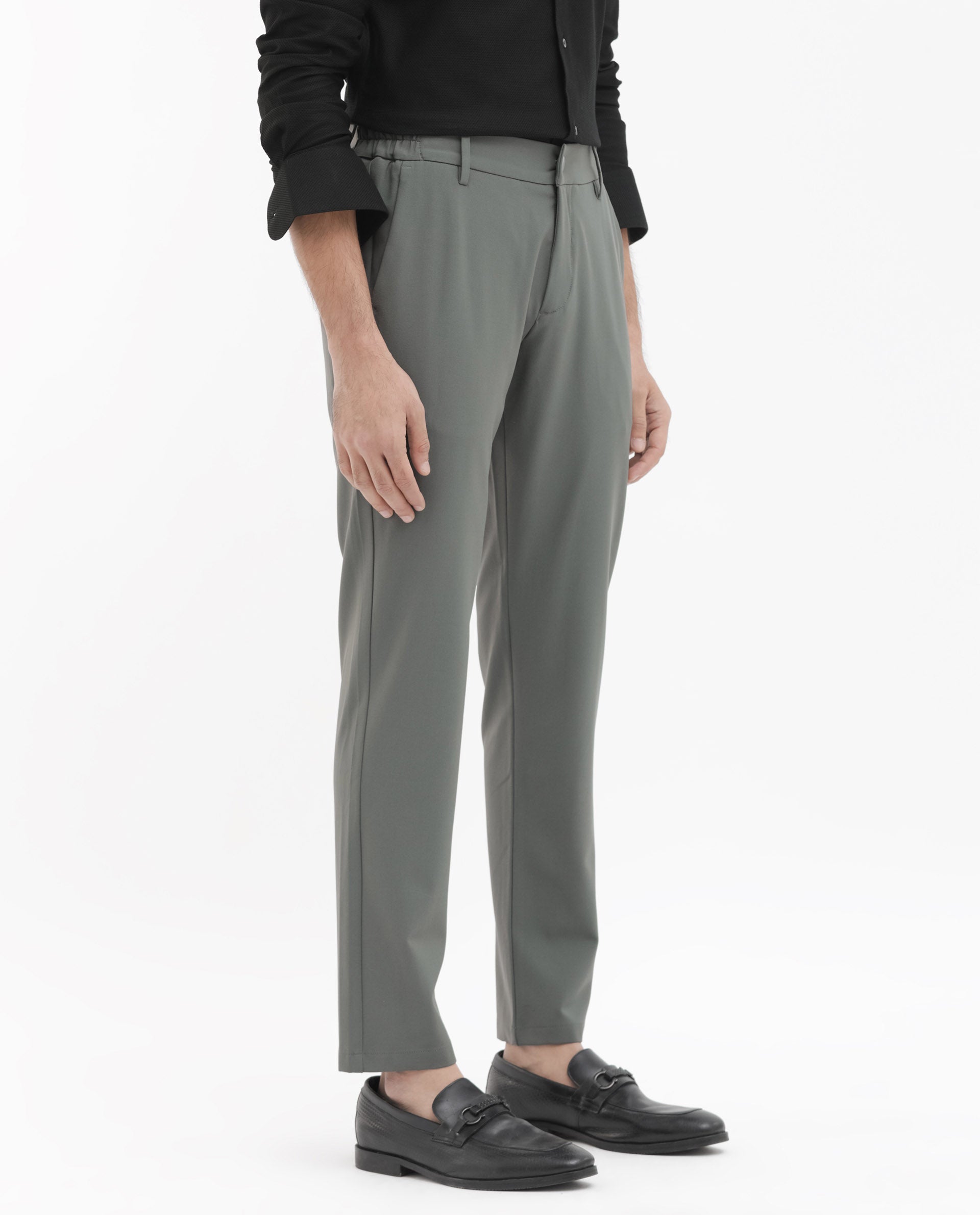 Rare Rabbit Men's Travel-24 Green Poly Viscose Lycra Fabric Blend Solid Trousers