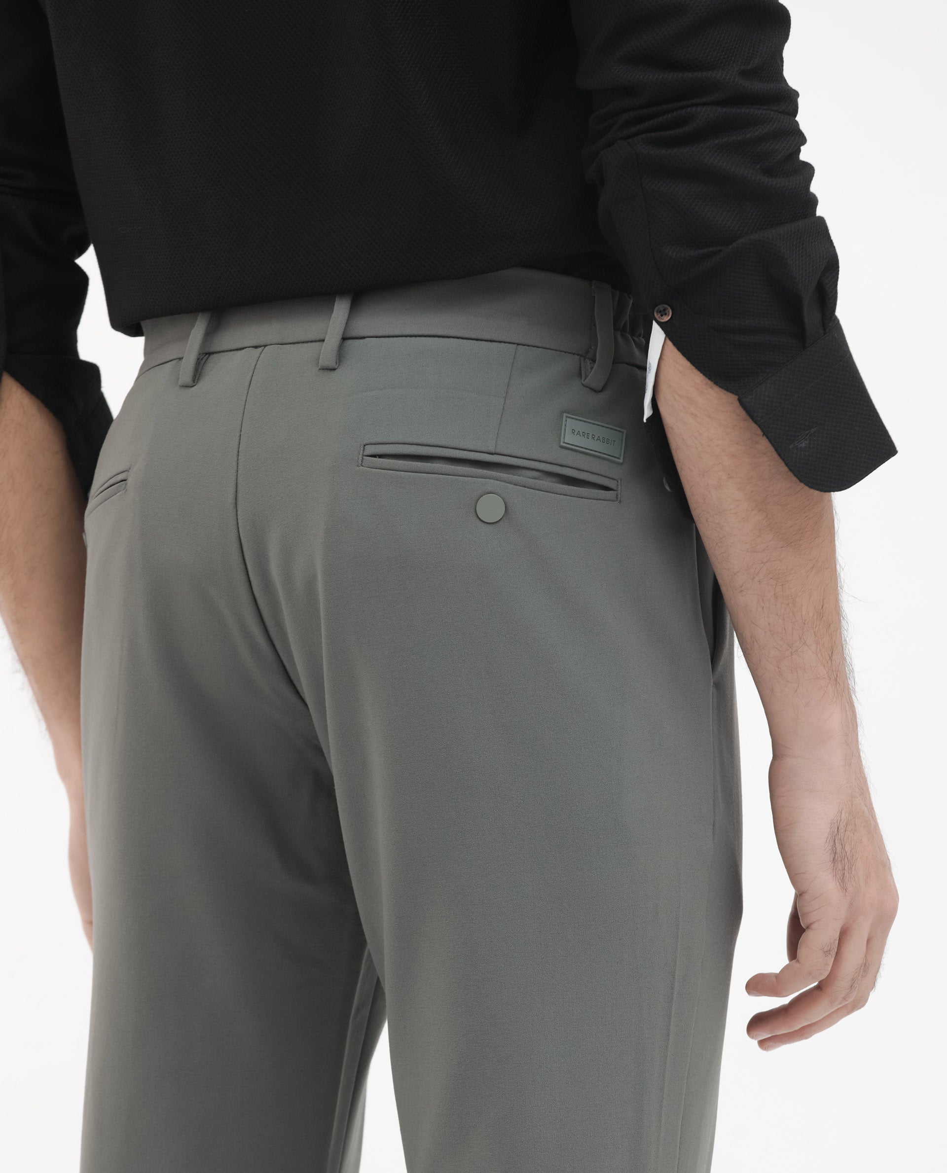 Rare Rabbit Men's Travel-24 Green Poly Viscose Lycra Fabric Blend Solid Trousers