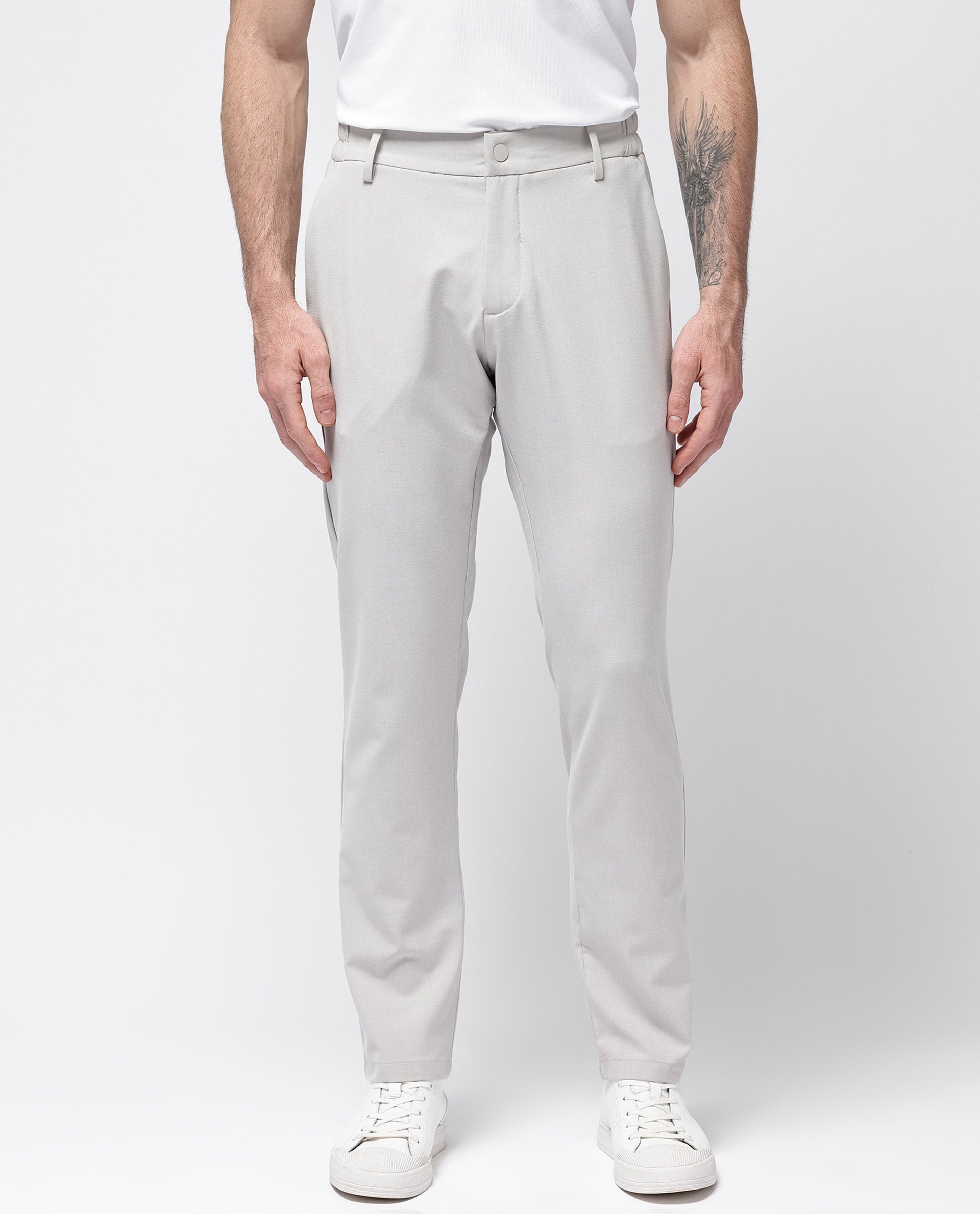 Rare Rabbit Men's Travel-24 Light Beige Poly Viscose Lycra Fabric Blend Solid Trousers