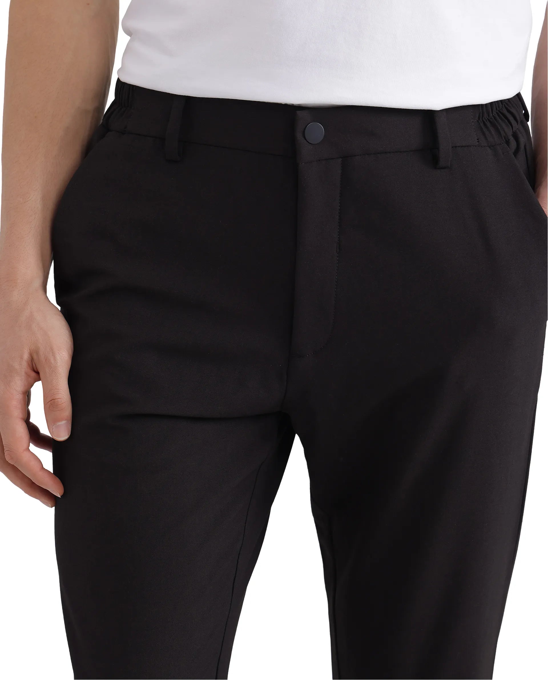 Rare Rabbit Men Travel-26 Dark Brown Cotton Elastane Fabric Button And Zip Closure Plain Trouser