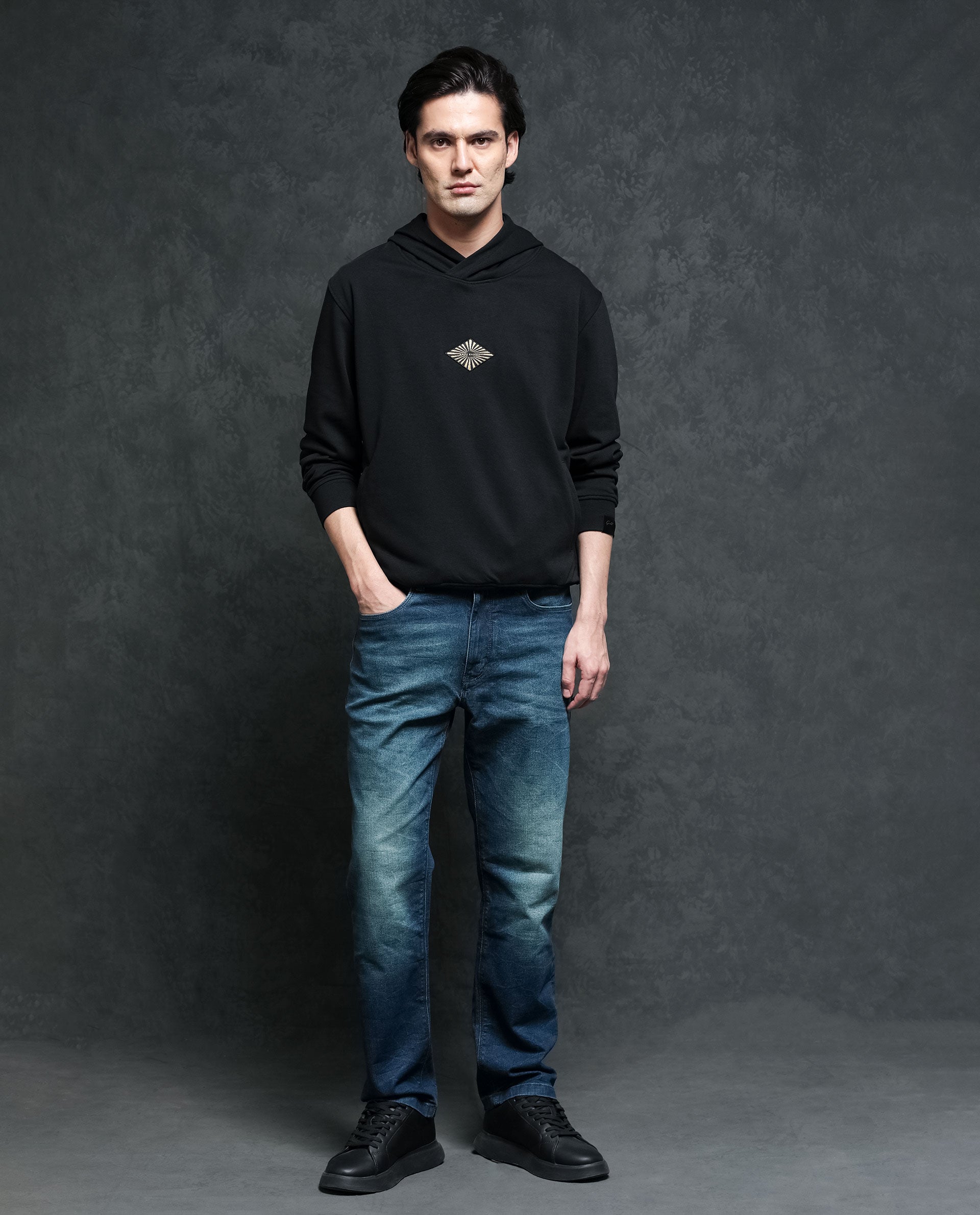 Rare Rabbit Men's Trivial Black Cotton Polyester Fabric Full Sleeves Logo Graphic Badge Hooded Sweatshirt