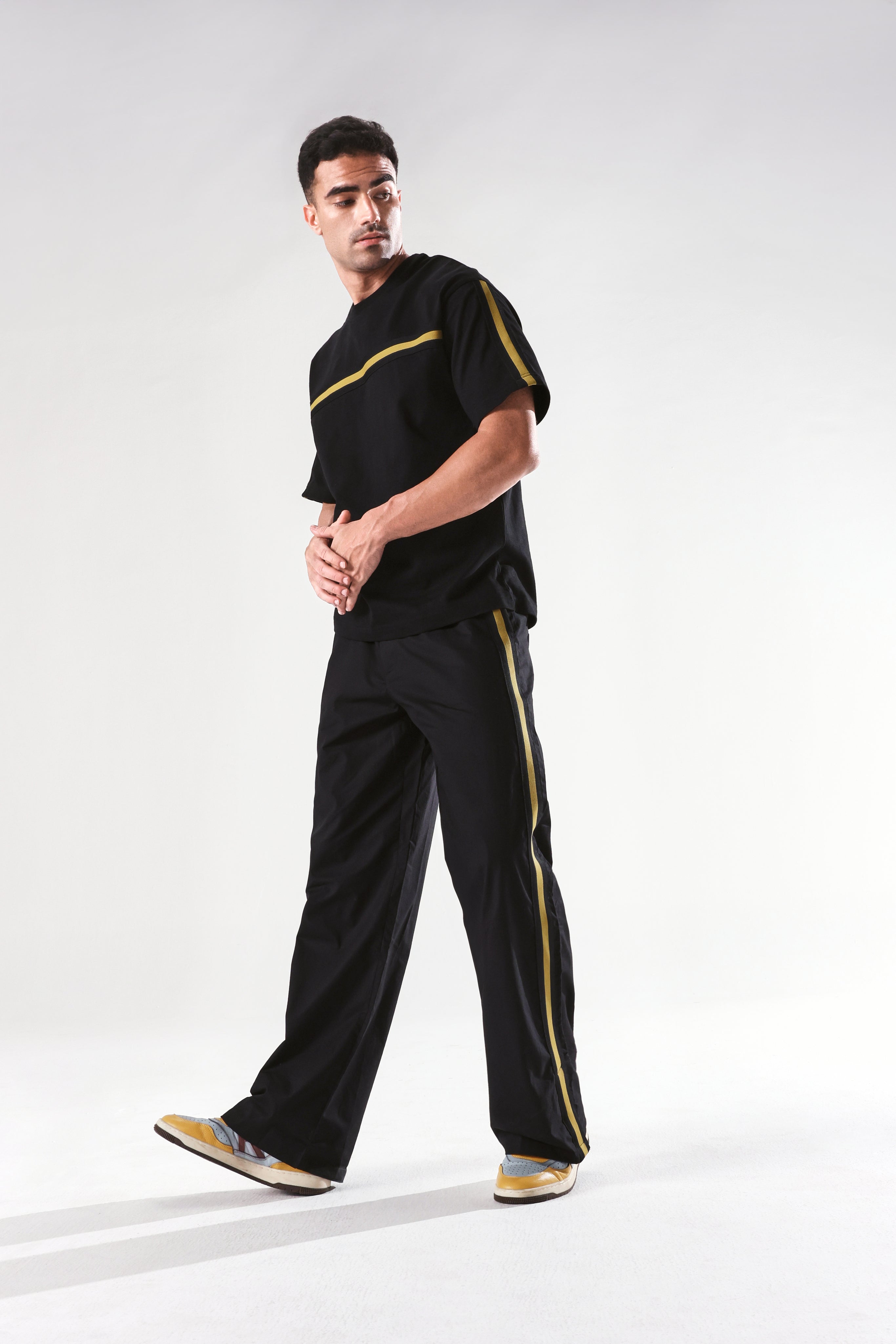 Rare Rabbit Men's Newnon Black Cotton Plain Baggy Fit Track Pant