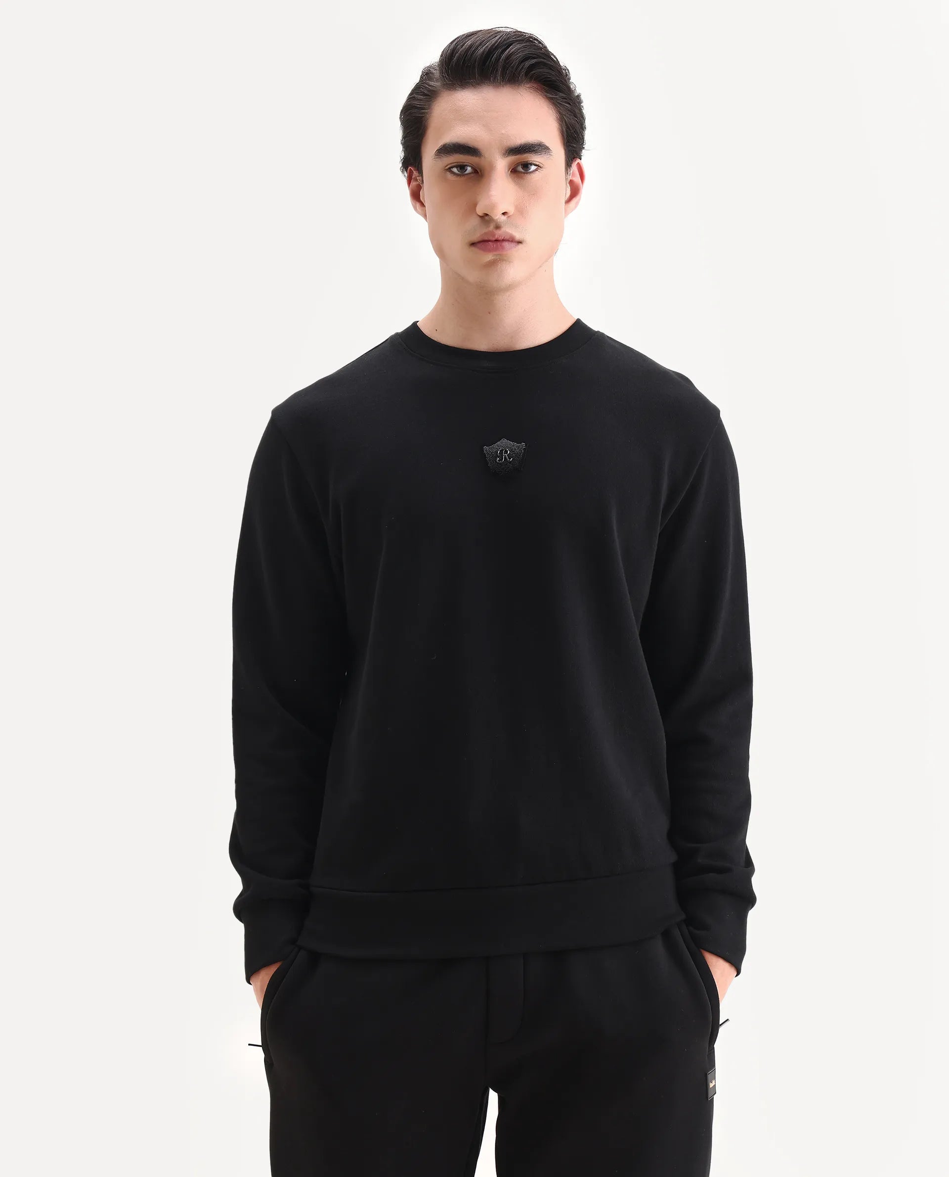 Rare Rabbit Men's Agon Black Rayon Blend Fabric Full Sleeves Crew Neck Badge Print Sweatshirt