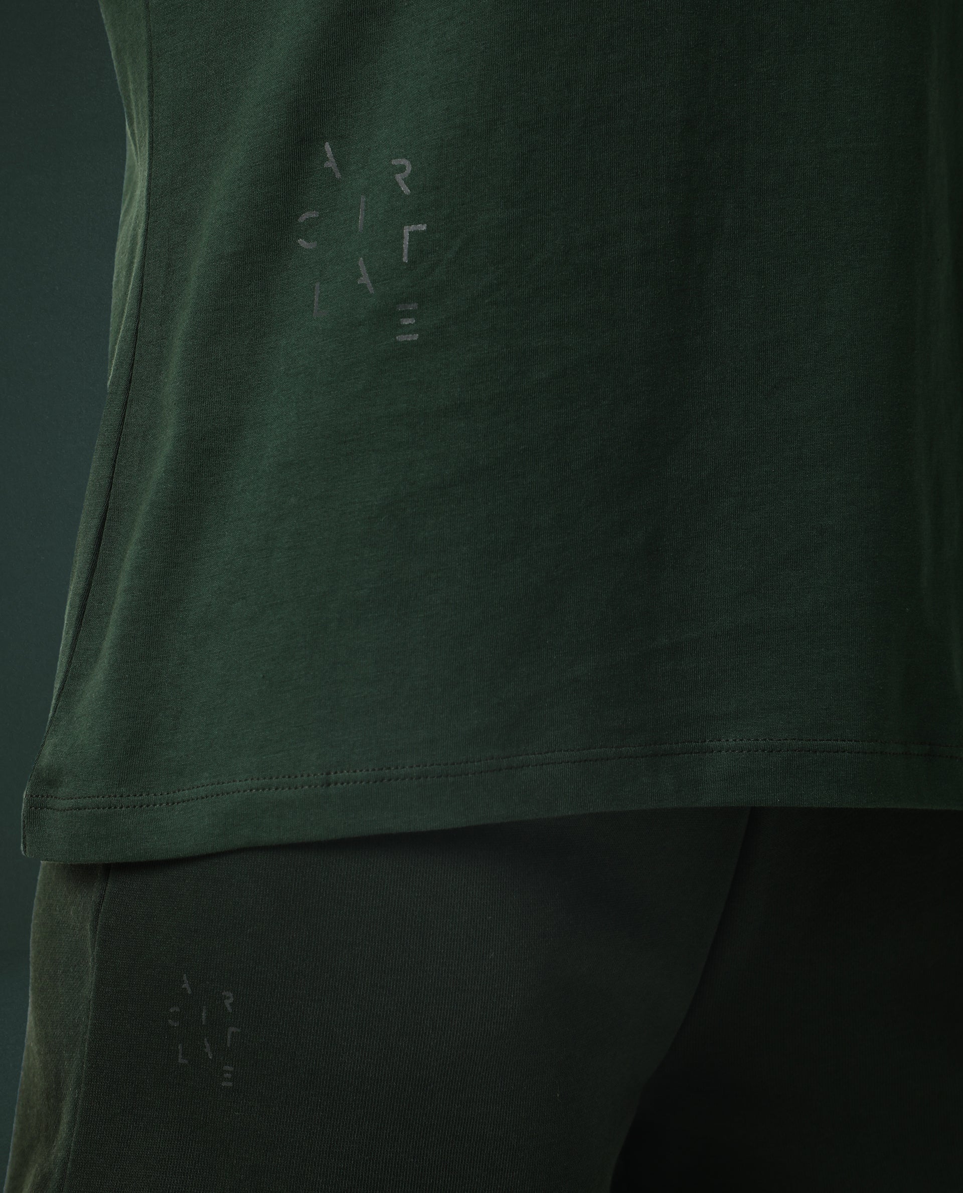 Rareism Women Arvi Dark Green Cotton Blend Fabric Regular Fit Half Sleeves Solid V-Neck T-Shirt