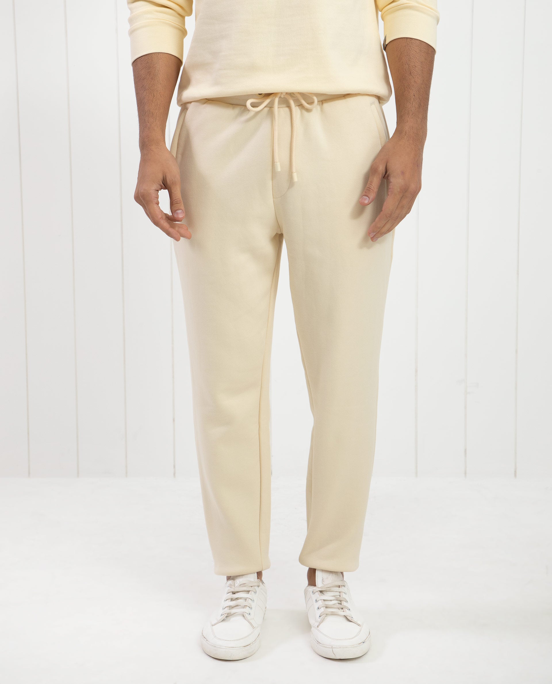 Rare Rabbit Mens Bard Light Yellow Cotton Polyester Fabric Drawstring Closure Regular Fit Mid Rise Trackpant