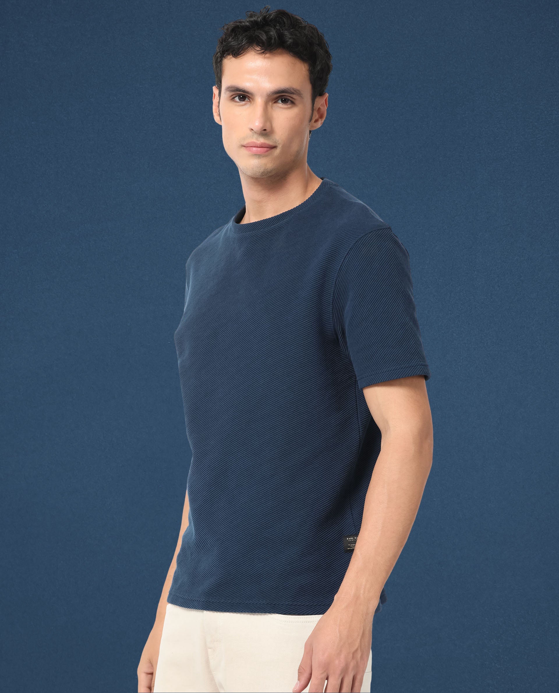 Rare Rabbit Men's Cas Petrol Solid Crew Neck Ottoman Textured Drop Shoulder Half Sleeves T-Shirt