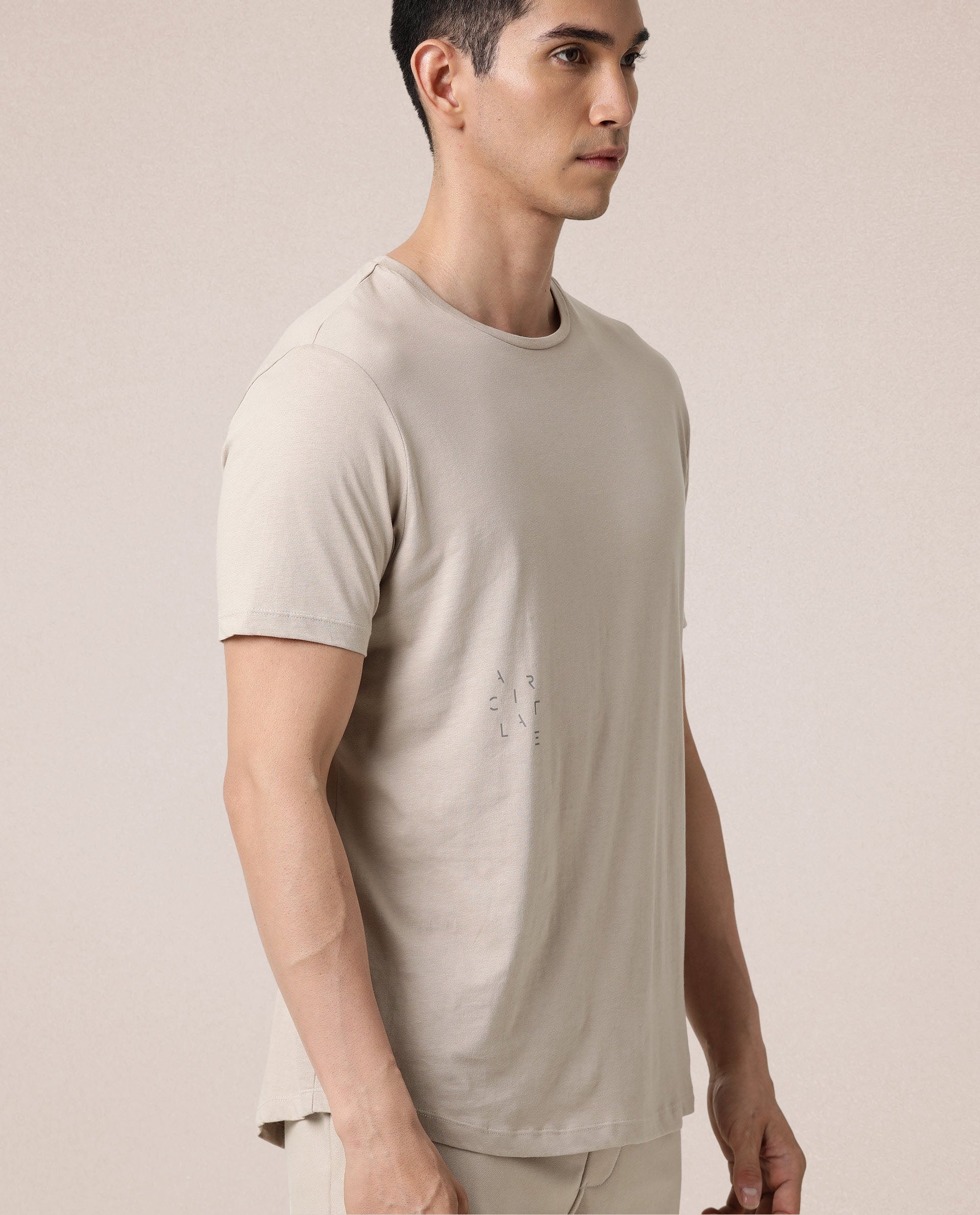 Rare Rabbit Articale Men's Caxel Beige Crew Neck Offset Brand Print Half Sleeves T-shirt
