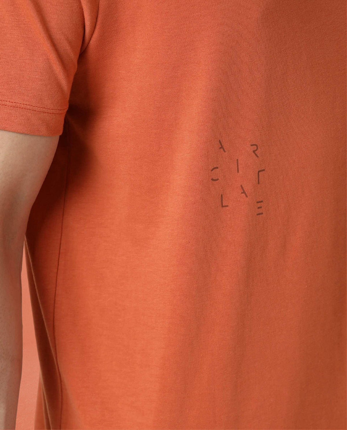 Rare Rabbit Articale Men's Caxel Tangy Orange Crew Neck Offset Brand Print Half Sleeves T-shirt