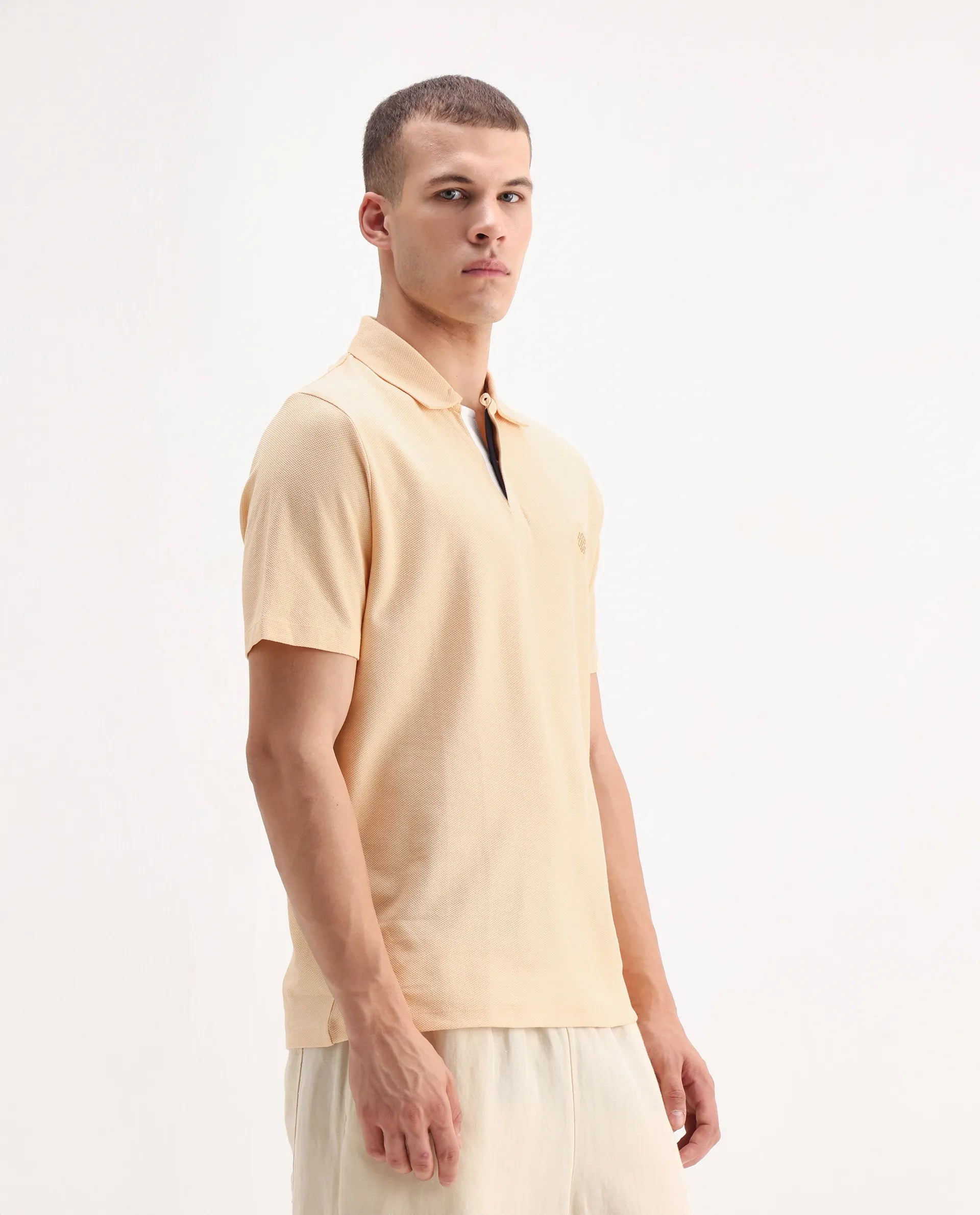 Rare Rabbit Men's Charles Light Yellow Cotton Plain Regular Fit Half Sleeve Polo