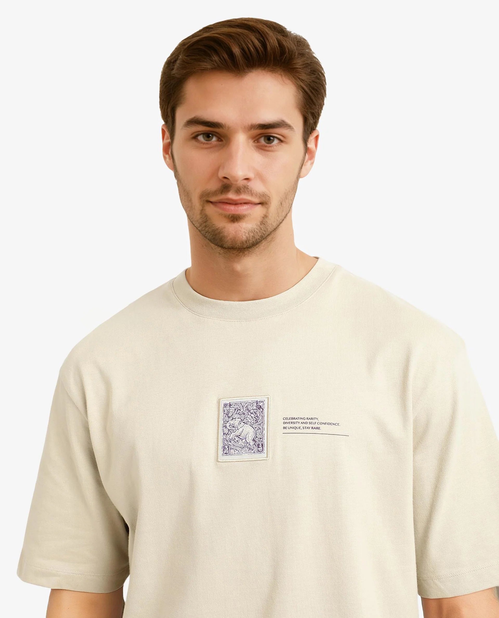 Rare Rabbit Men Iylo Beige Cotton Fabric Short Sleeve Crew Neck Oversized Fit Graphic Print T-Shirt