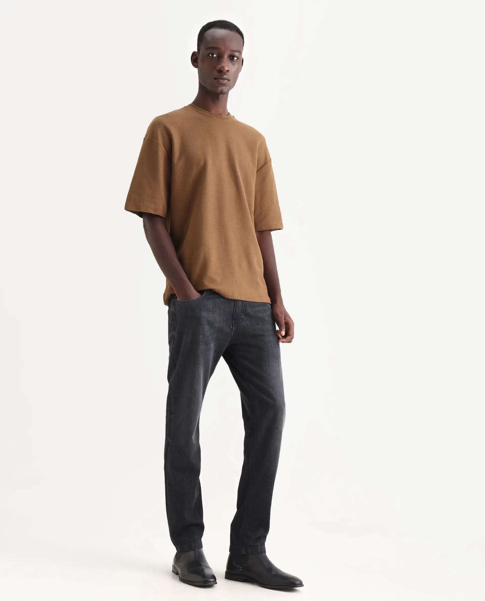 Rare Rabbit Men's Kairo-1 Black Cotton Plain Kurt Carrot Fit Jeans