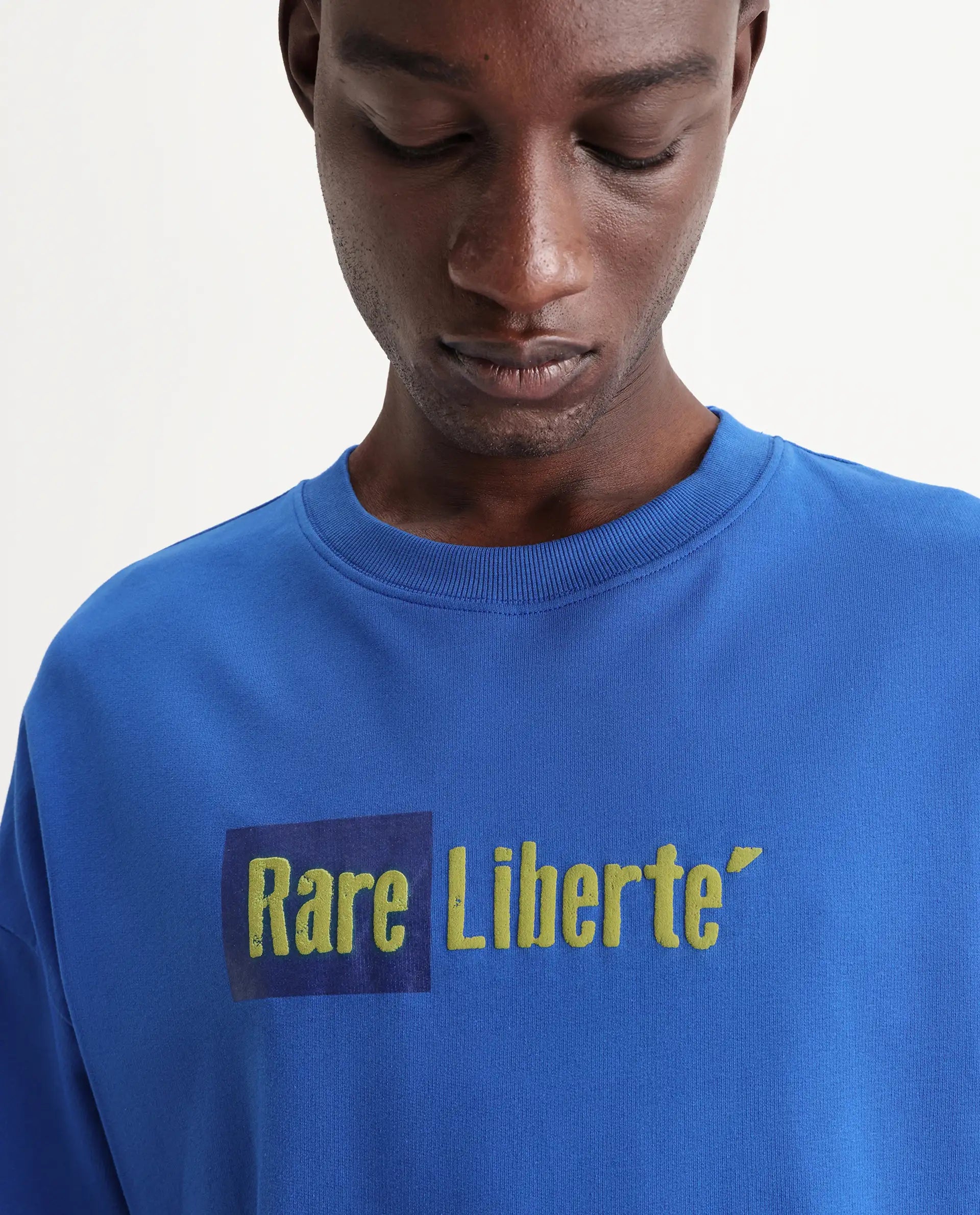 Rare Rabbit Men's Moshe Flouroscent Blue Cotton Graphic Print Oversized Fit Half Sleeve Crew Neck T-Shirt