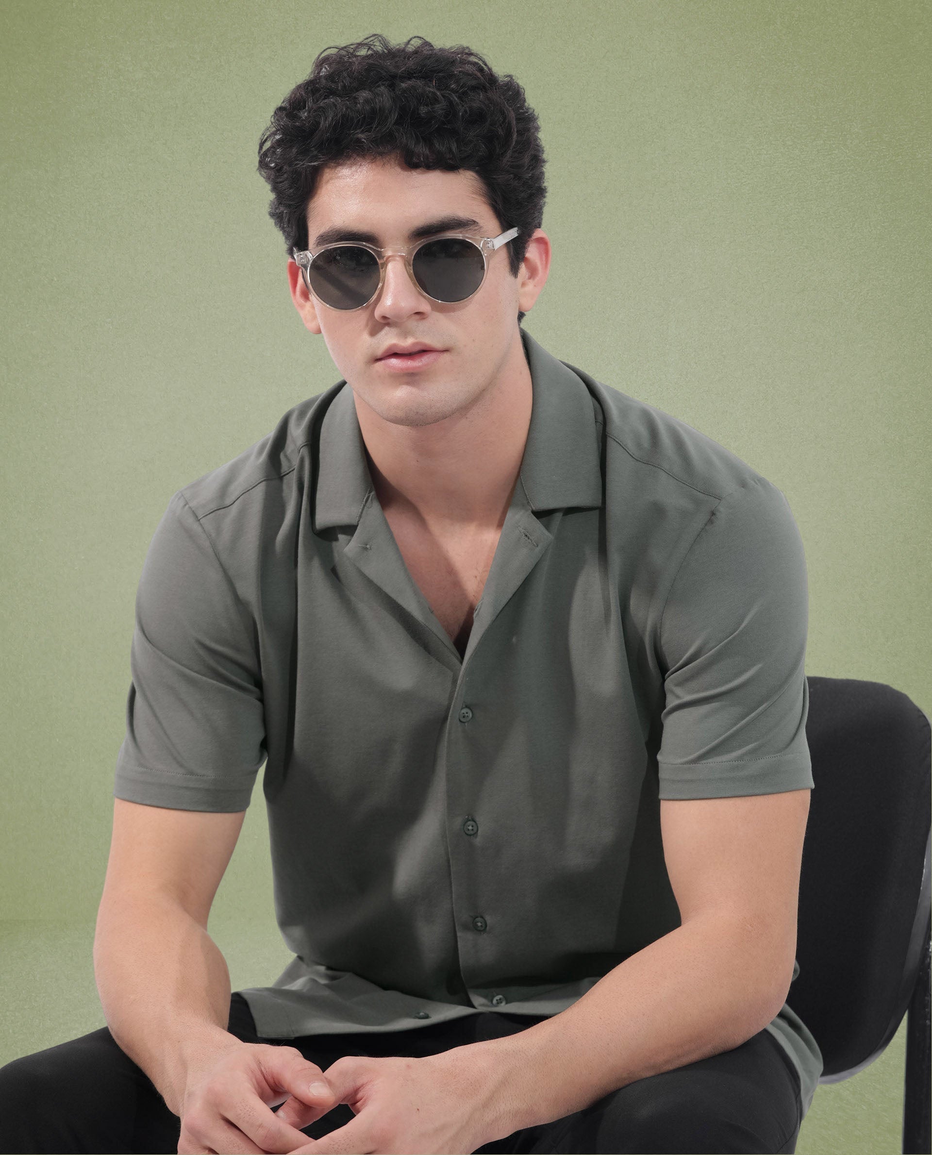 Rare Rabbit Men's Nick Dark Green Cotton Lycra Fabric Cuban Collar Half Sleeves Solid Shirt