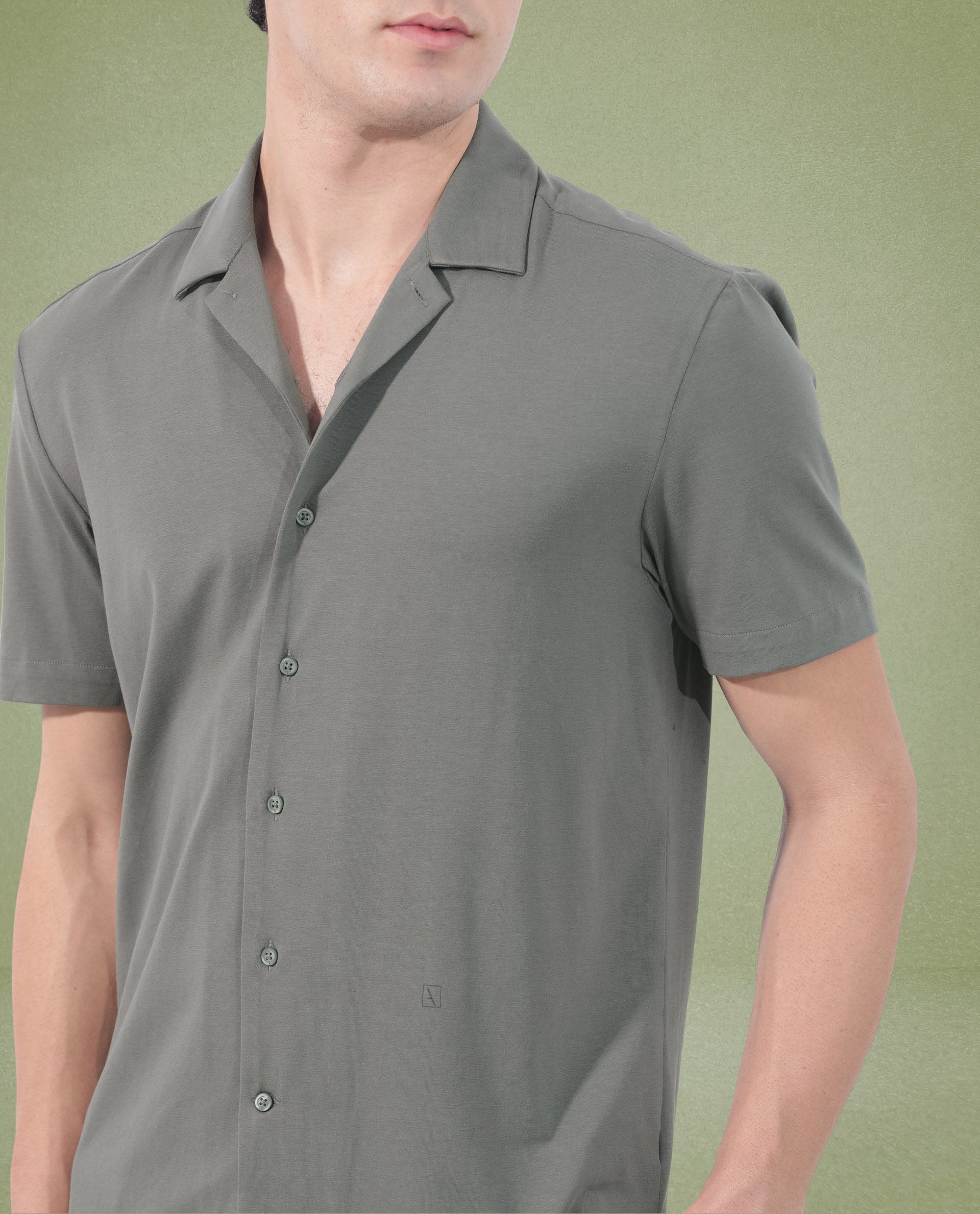 Rare Rabbit Men's Nick Dark Green Cotton Lycra Fabric Cuban Collar Half Sleeves Solid Shirt