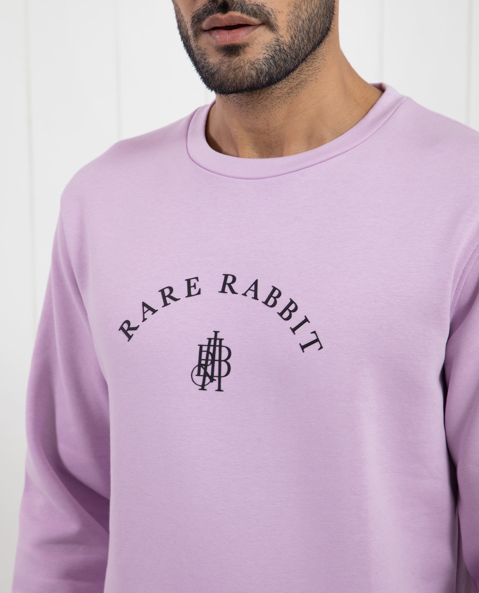 Rare Rabbit Men's Nomic Pastel Purple Cotton Polyester Fabric Full Sleeves Logo Graphic Print Sweatshirt