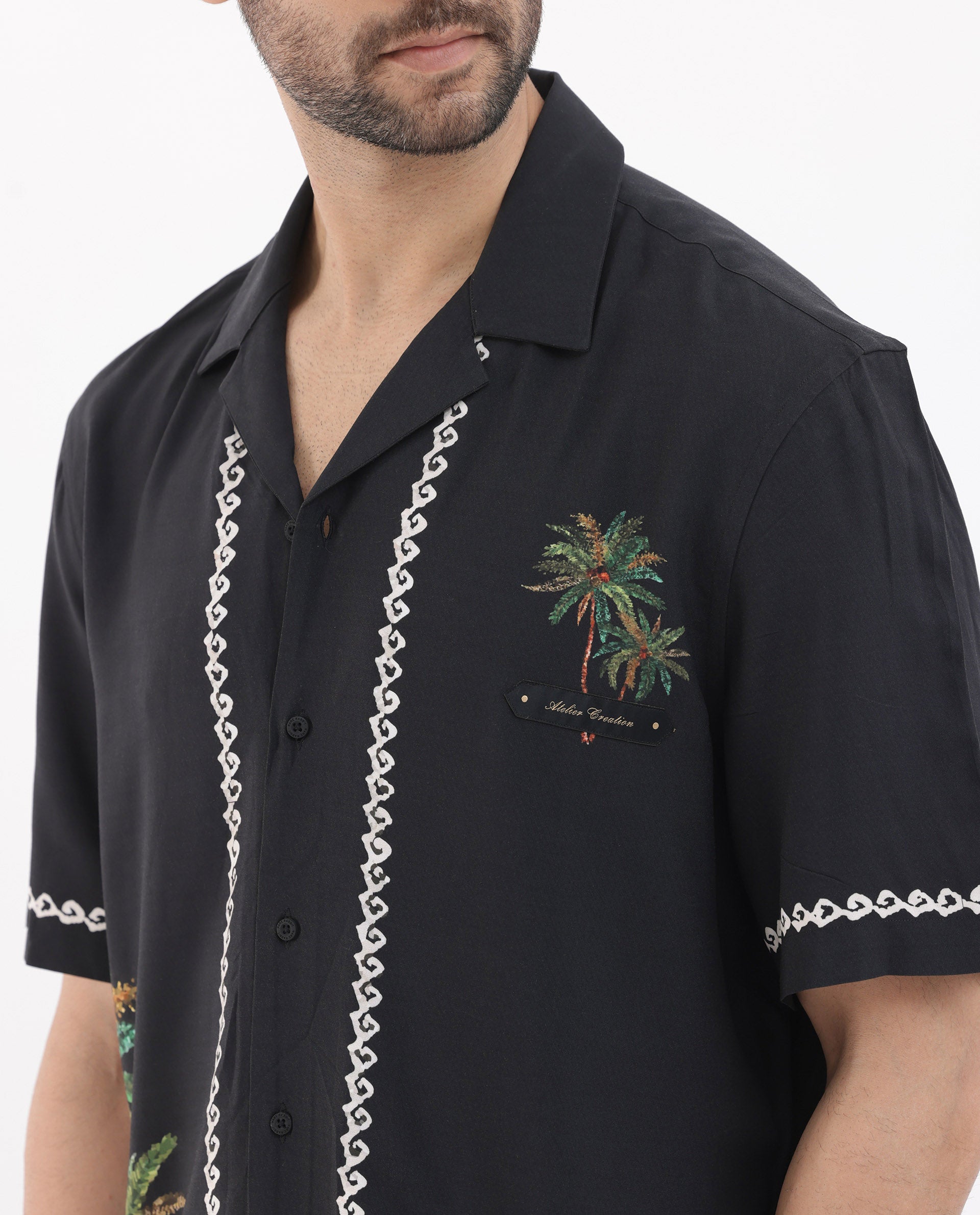 Rare Rabbit Men's Palms Black Viscose Fabric Cuban Collar Half Sleeves Boxy Fit Placement Tropical Print Bowler Shirt