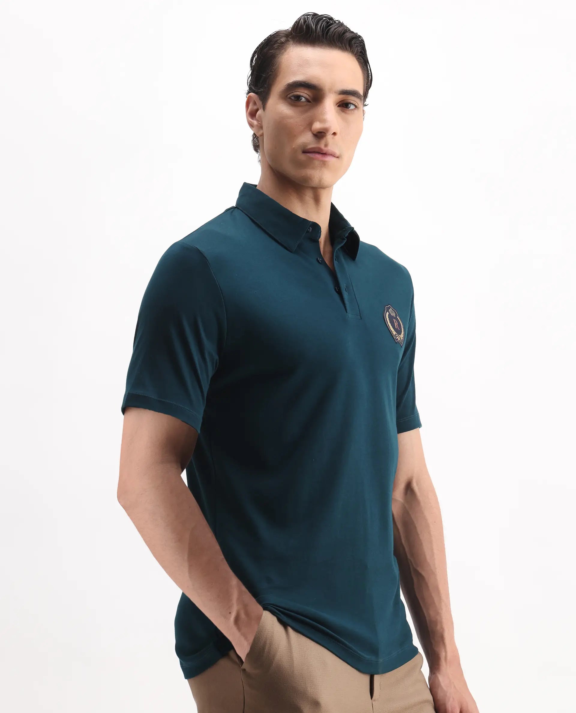 Rare Rabbit Men's Ritz Dark Green Cotton Plain Regular Fit Half Sleeve Polo