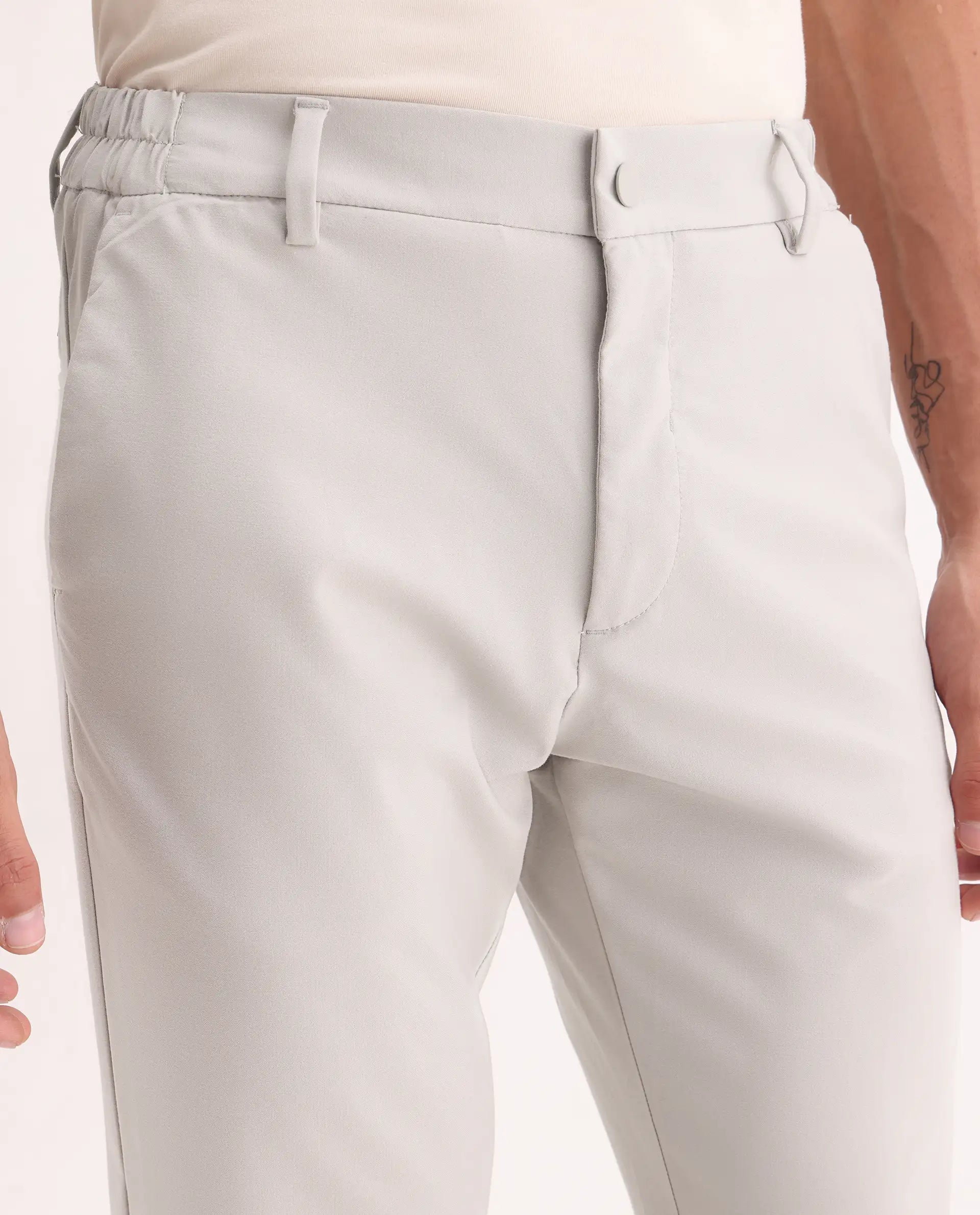 Rare Rabbit Men's Travel-11 Light Beige Polyester Blend Plain Regular Fit Trouser