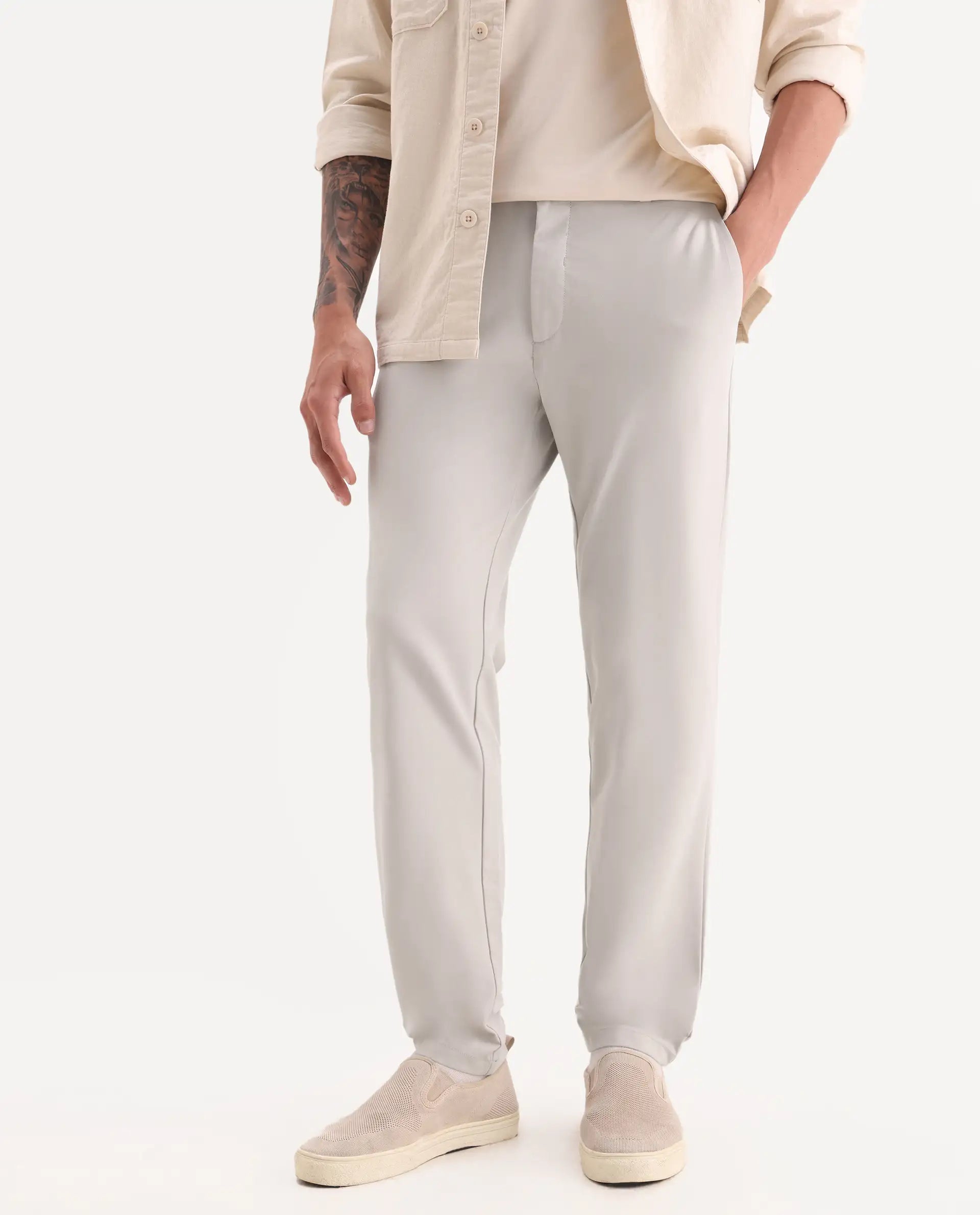 Rare Rabbit Men's Travel-11 Light Beige Polyester Blend Plain Regular Fit Trouser