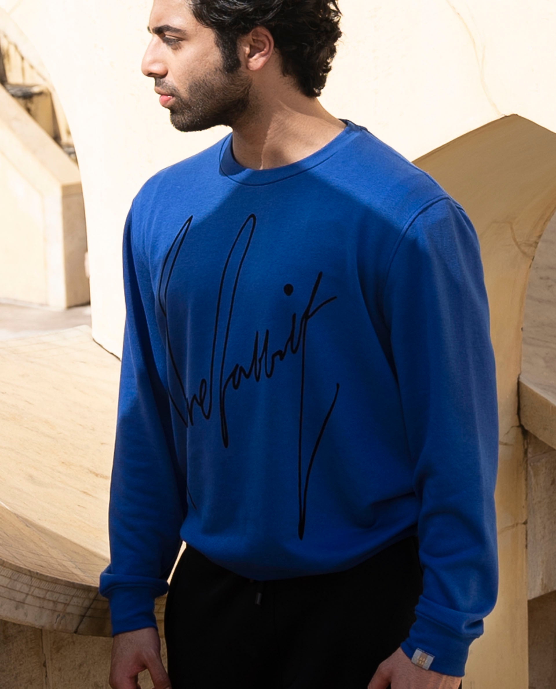 Rare Rabbit Men's Flocker Fluorescent Blue Cotton Fabric Full Sleeves Signature Branding Sweatshirt